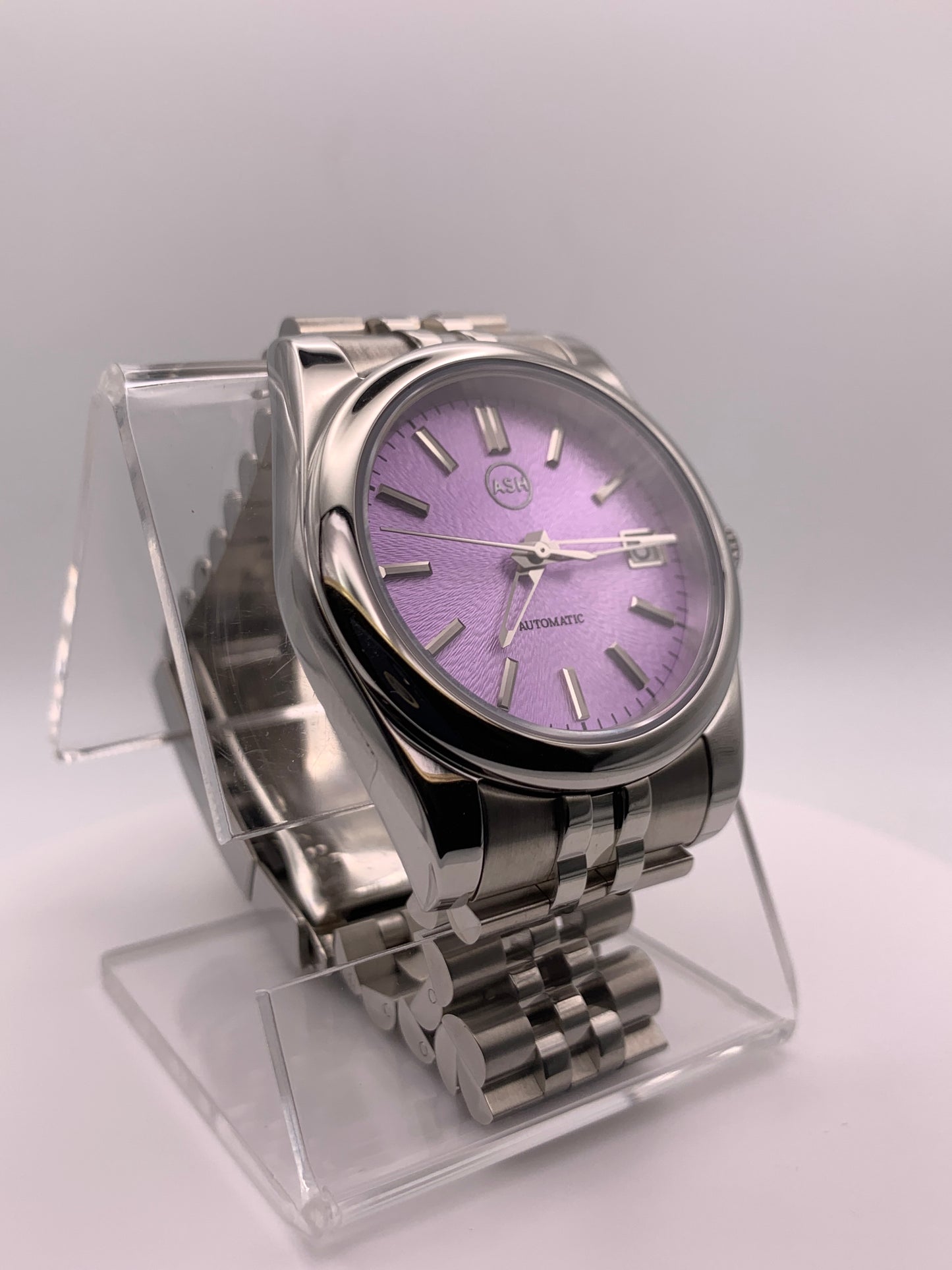 ‘Sold - Highly figured lavender dial. 36mm sport watch on bracelet.