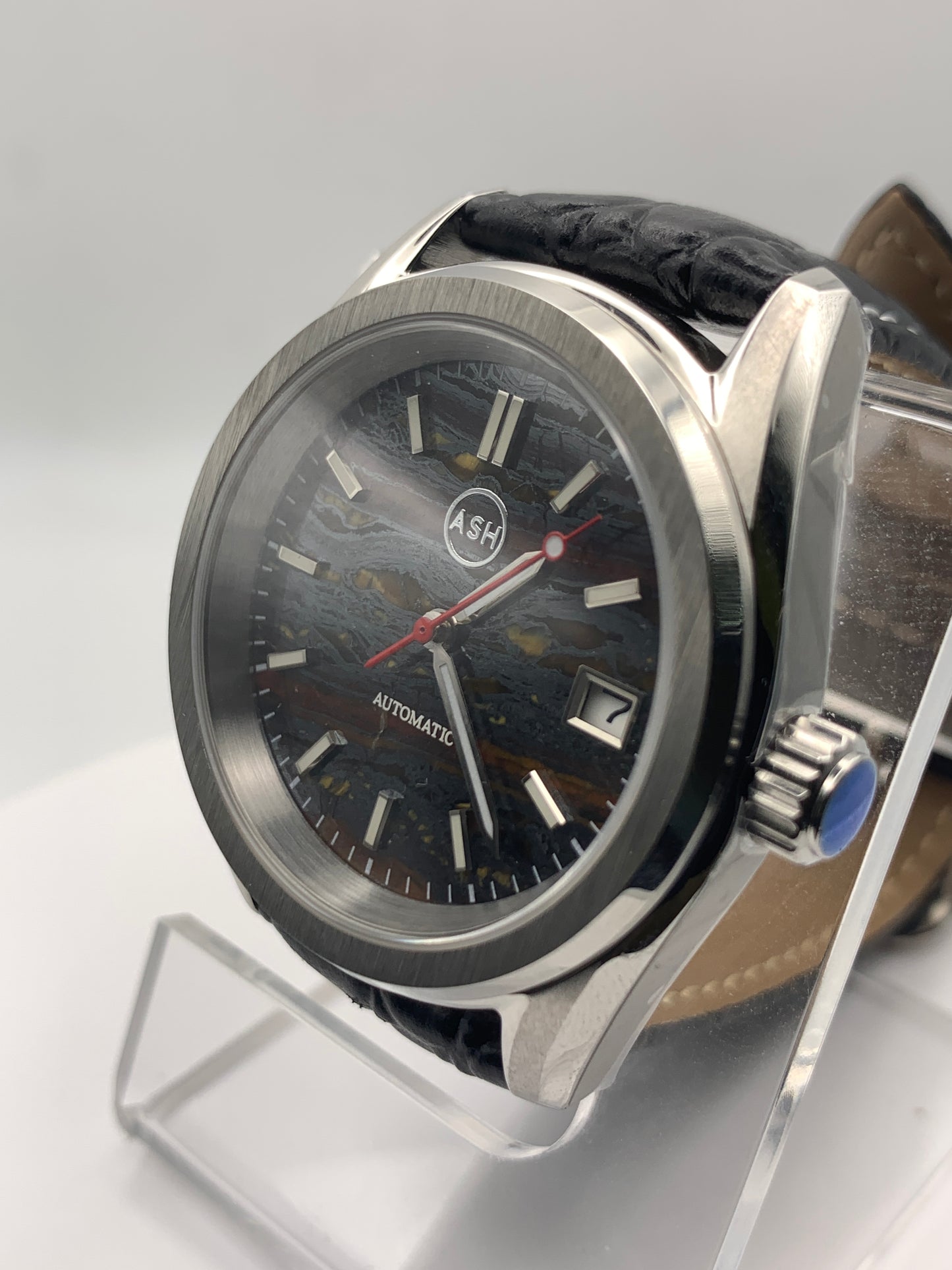 Agharta. 39mm Stainless steel. Iron Tiger Eye dial. Sapphire crystal. Seiko NH35.