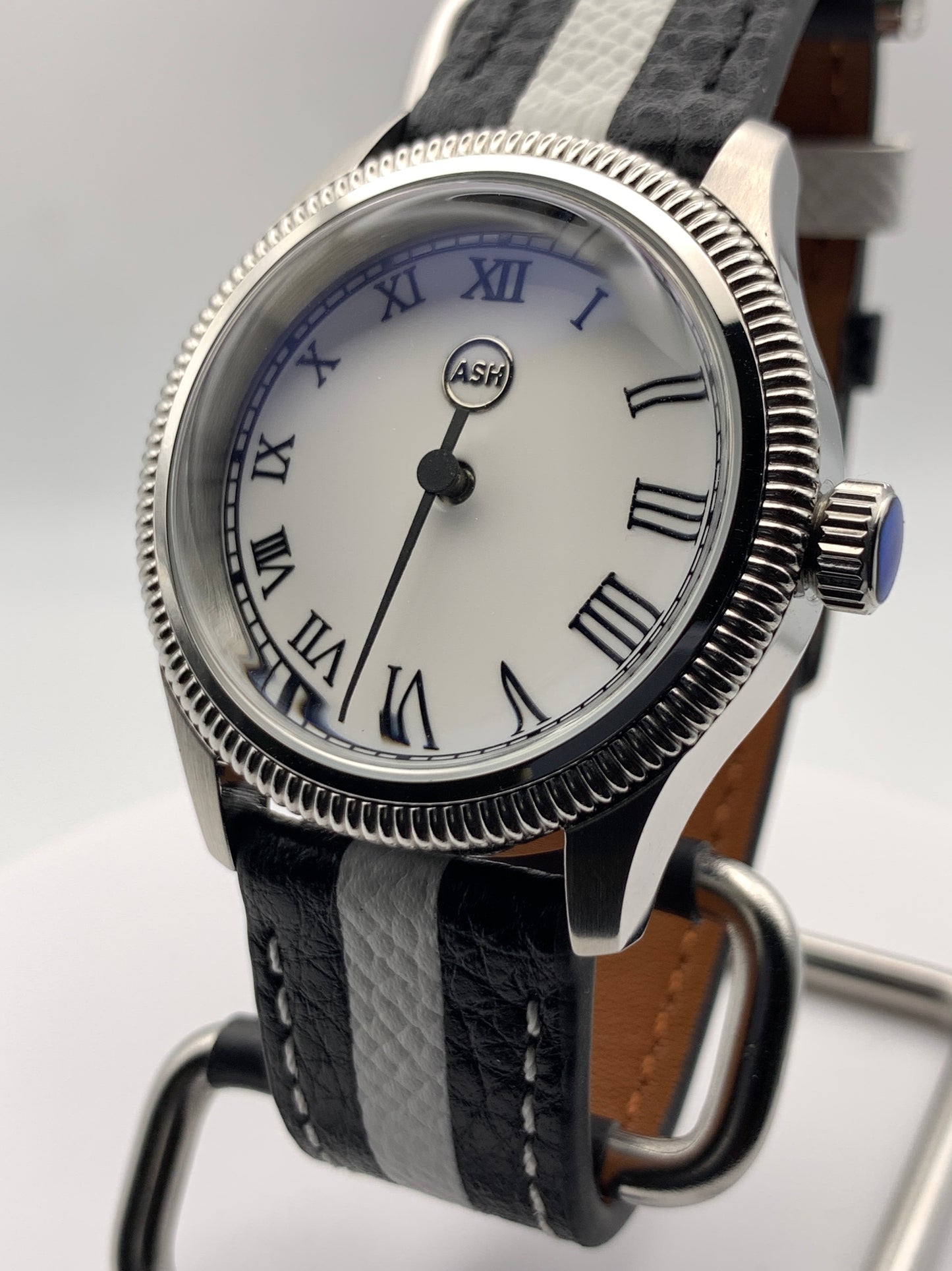 Thereabouts - One hand watch. 38mm coin edged stainless steel case. Enamel dial. Boxed K-1 crystal. Exhibition case back with blue custom rotor. Seiko NH38.