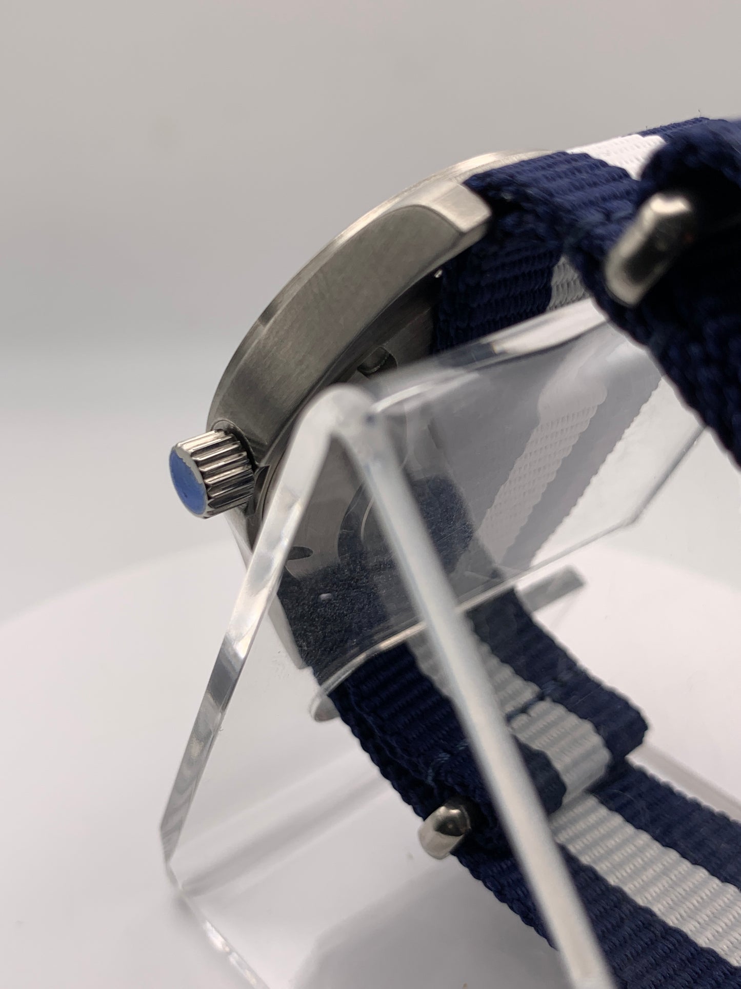 Cloth & Steel. 38mm brushed stainless steel. Ornate dial. Sapphire crystal. Seiko NH38