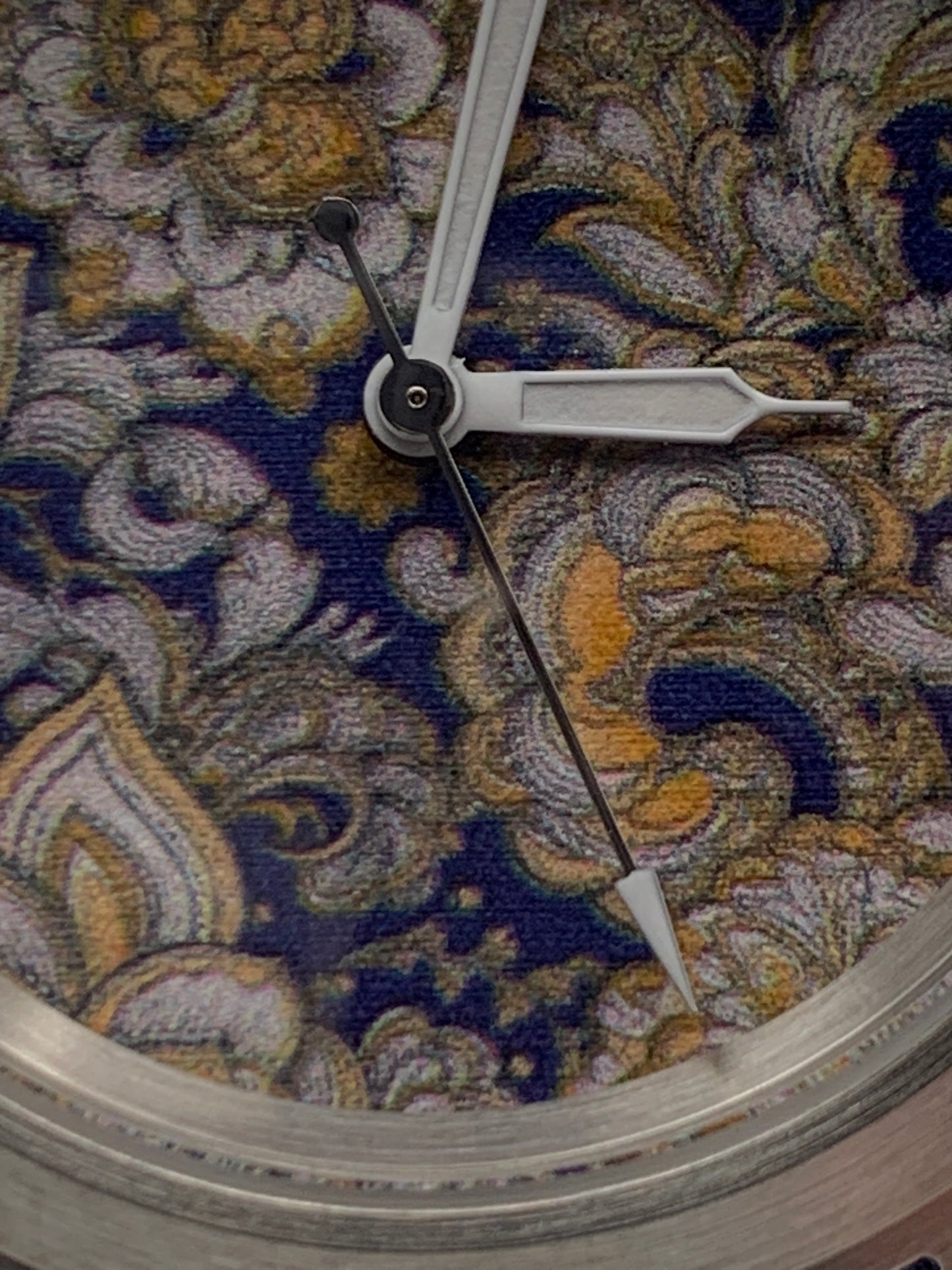 Cloth & Steel. 38mm brushed stainless steel. Ornate dial. Sapphire crystal. Seiko NH38