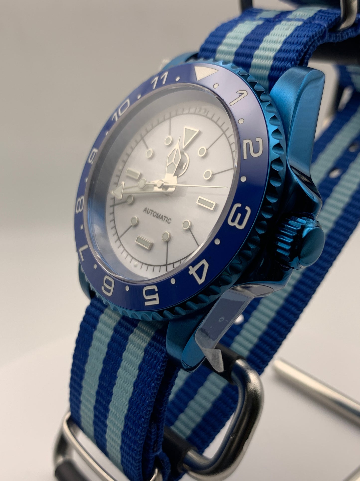 Europa - 41mm Blue anodized stainless steel case. Sapphire crystal. Seiko NH38.