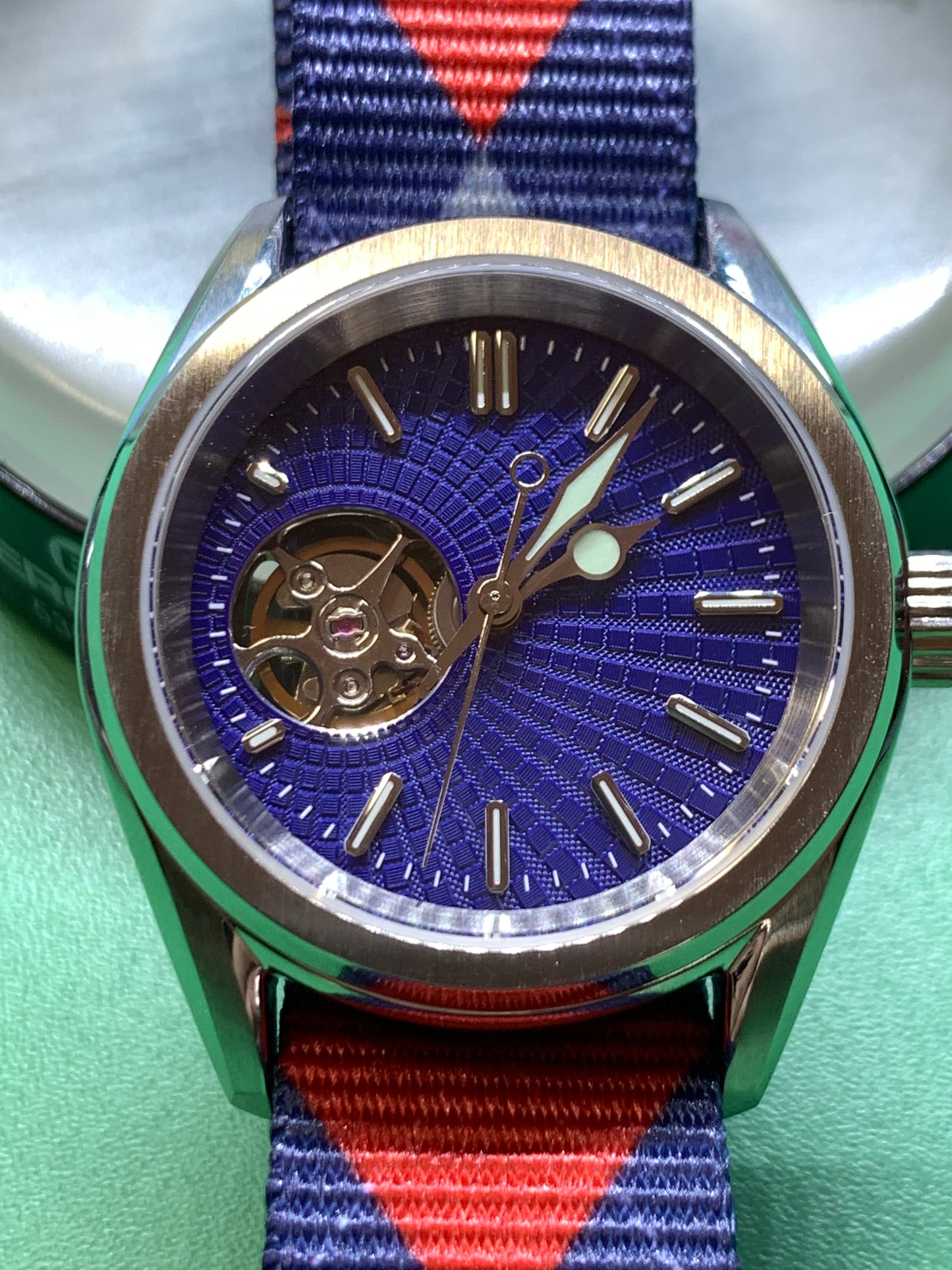 Blue Shift.  38mm Stainless steel. Sapphire crystal.  Seiko NH38.
