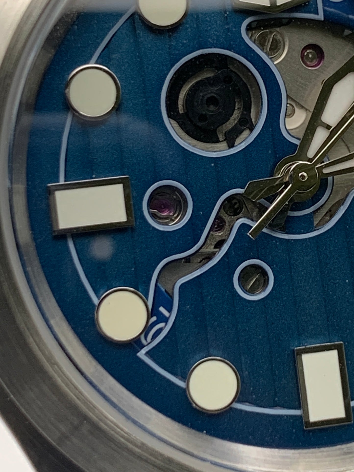 Wintermute. 39mm brushed stainless steel case. Domed sapphire crystal. Seiko NH35 with blue date wheel.