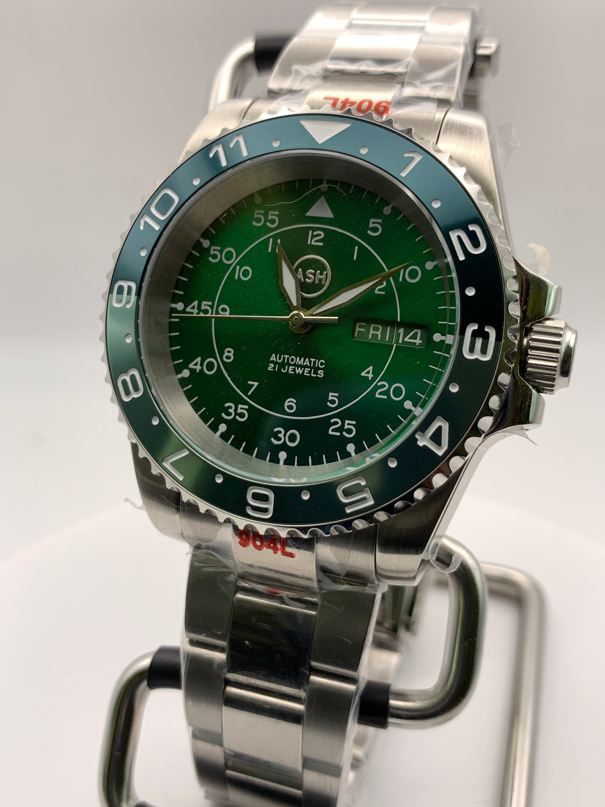 Dead Reckoning - 41mm Stainless Steel case with matching bracelet. Sapphire crystal. Seiko NH36 with green day/date wheels.