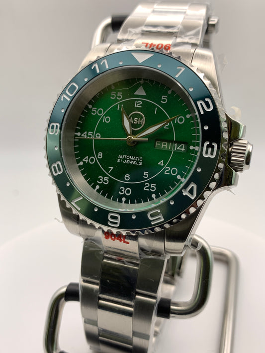 Dead Reckoning - 41mm Stainless Steel case with matching bracelet. Sapphire crystal. Seiko NH36 with green day/date wheels.
