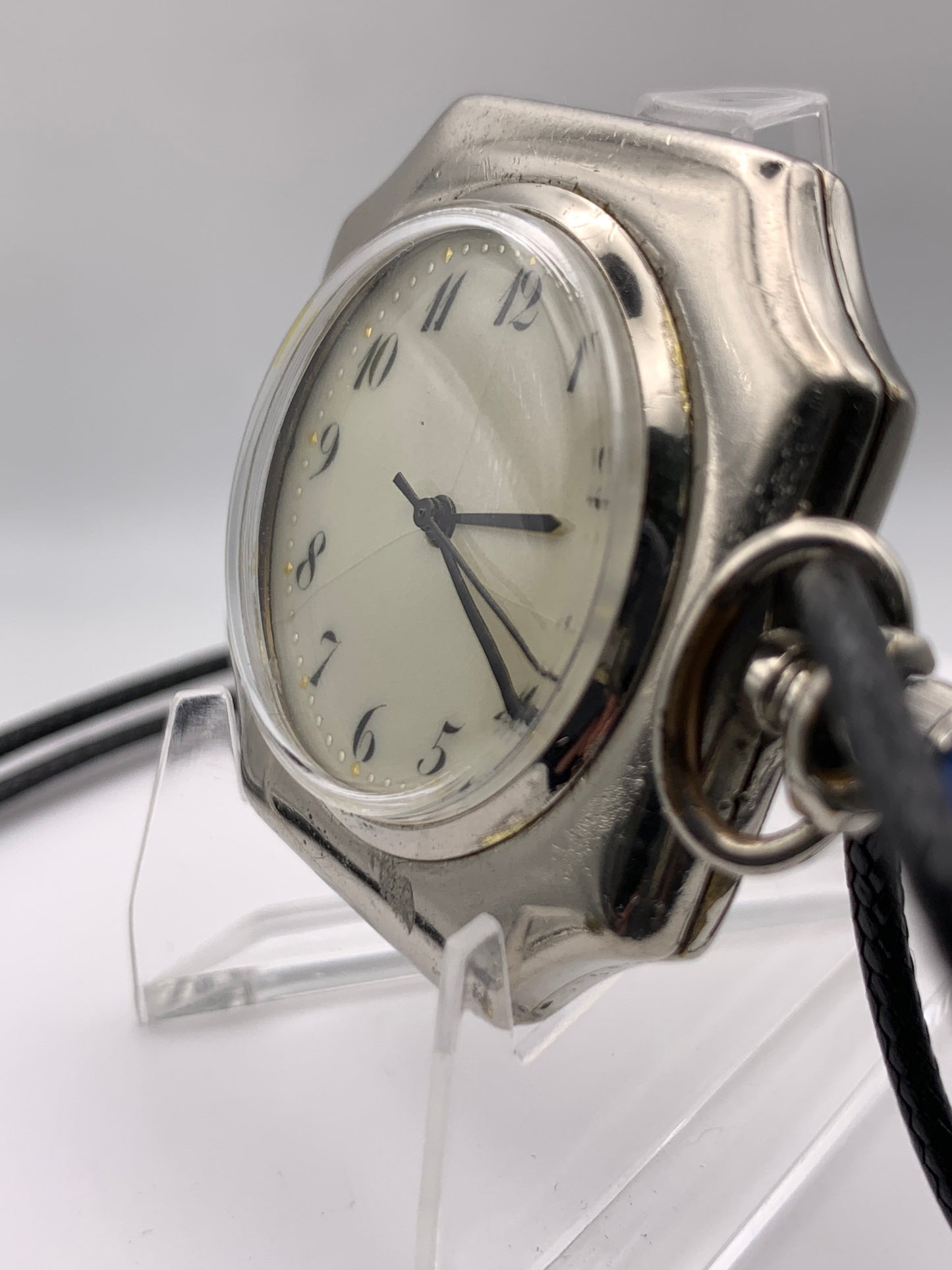 Palimpsest.  40 x 40mm plated brass case. Vintage pendant watch conversion. Domed acrylic crystal. Original enamel dial. Miyota 2036.