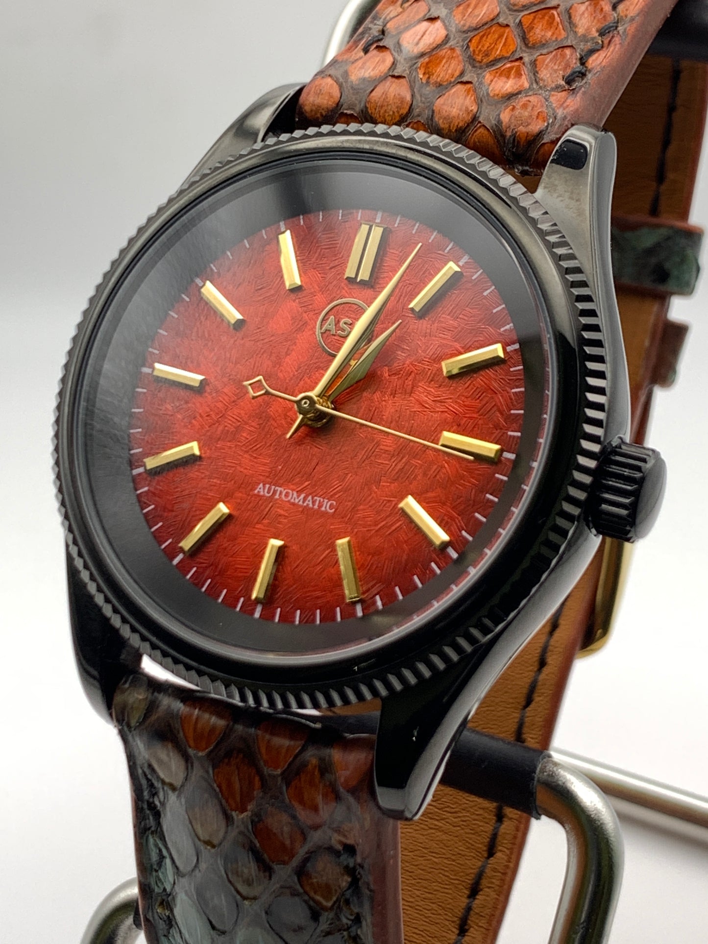 Ecthelion. Golden fire livery. 39mm fluted, PVD coated, stainless steel case. Sapphire crystal. Seiko NH38. Dragon scale strap. Mystical powers.