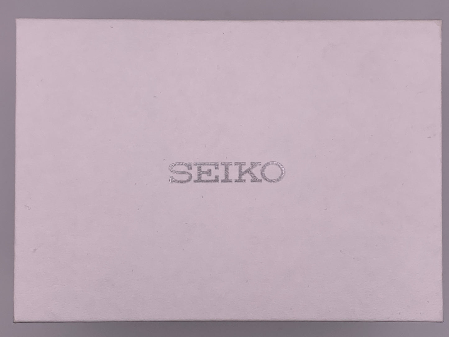Seiko SUR633- 30mm Stainless steel case. Silver sunray dial. Sapphire crystal. 6n22 quartz movement. 100m water resistance. Box and papers.