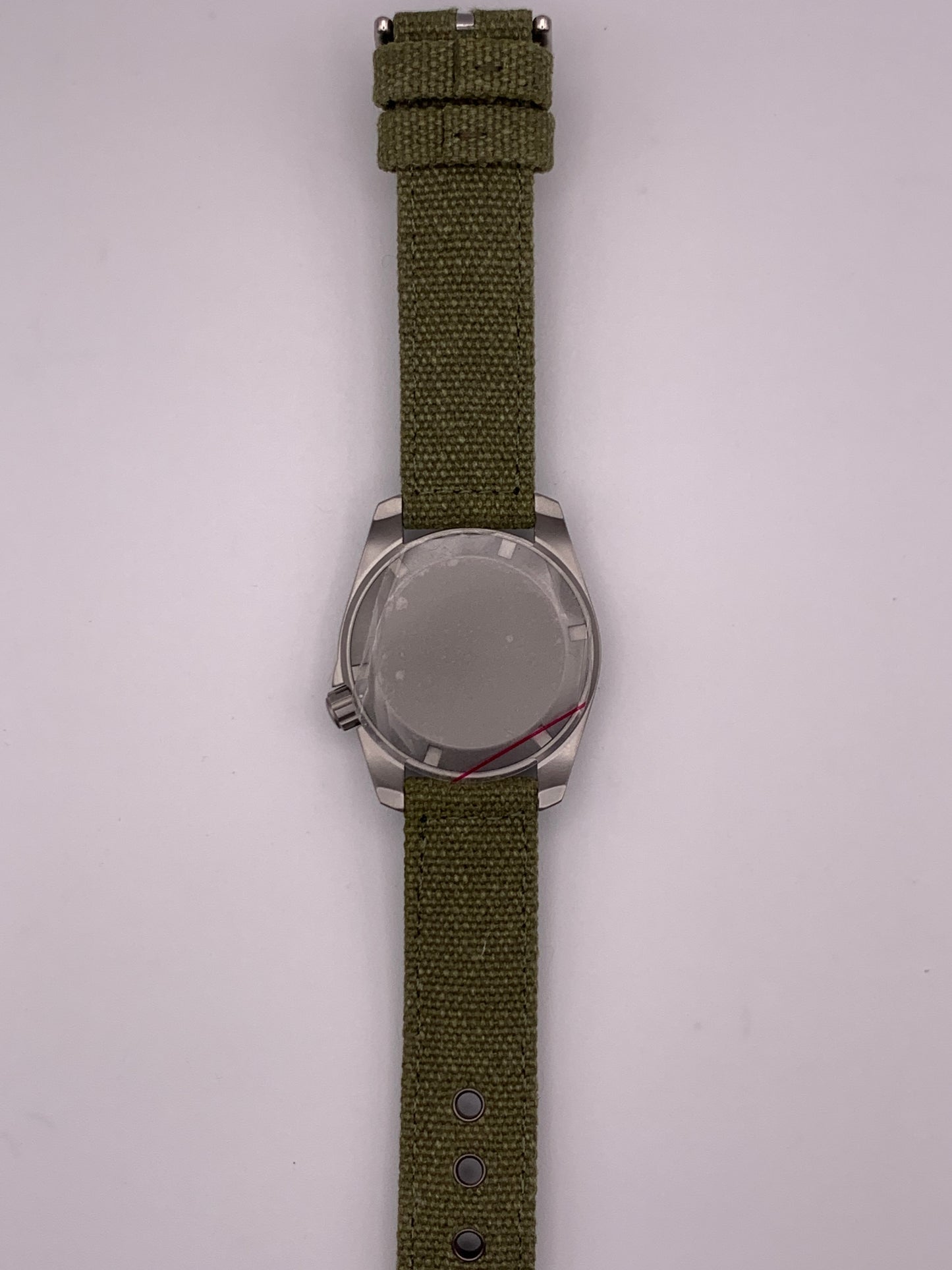 Outrider. 38mm bead blasted stainless steel. Crown at 3.8.  Sapphire crystal. Seiko NH35.