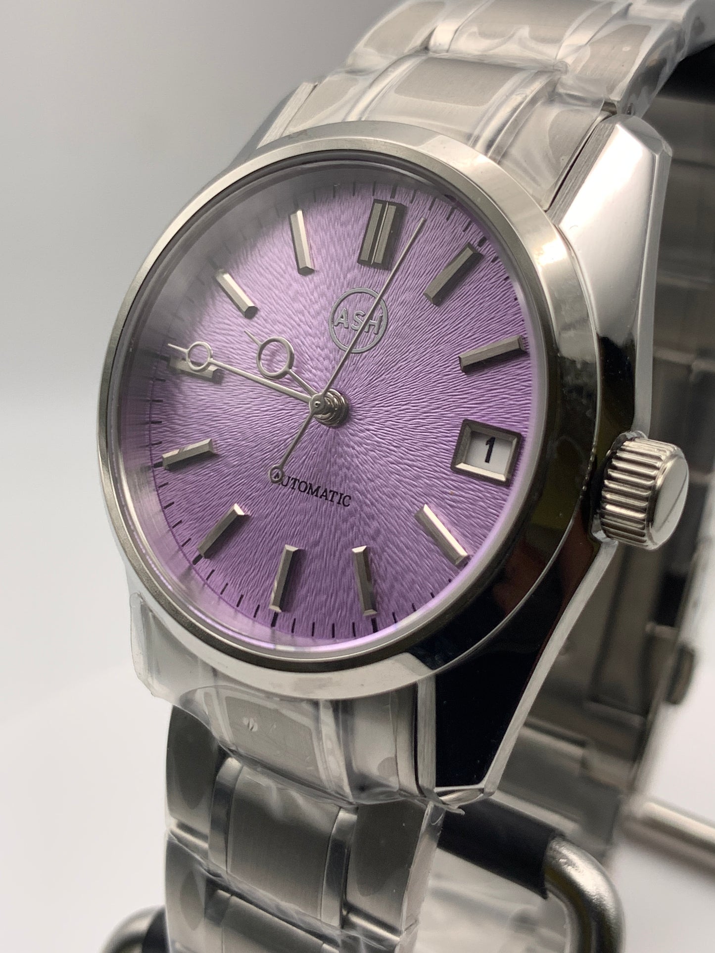 Violet II - 36mm Stainless steel case with matching bracelet. Unique dial. Sapphire crystal. Seiko NH35 automatic.