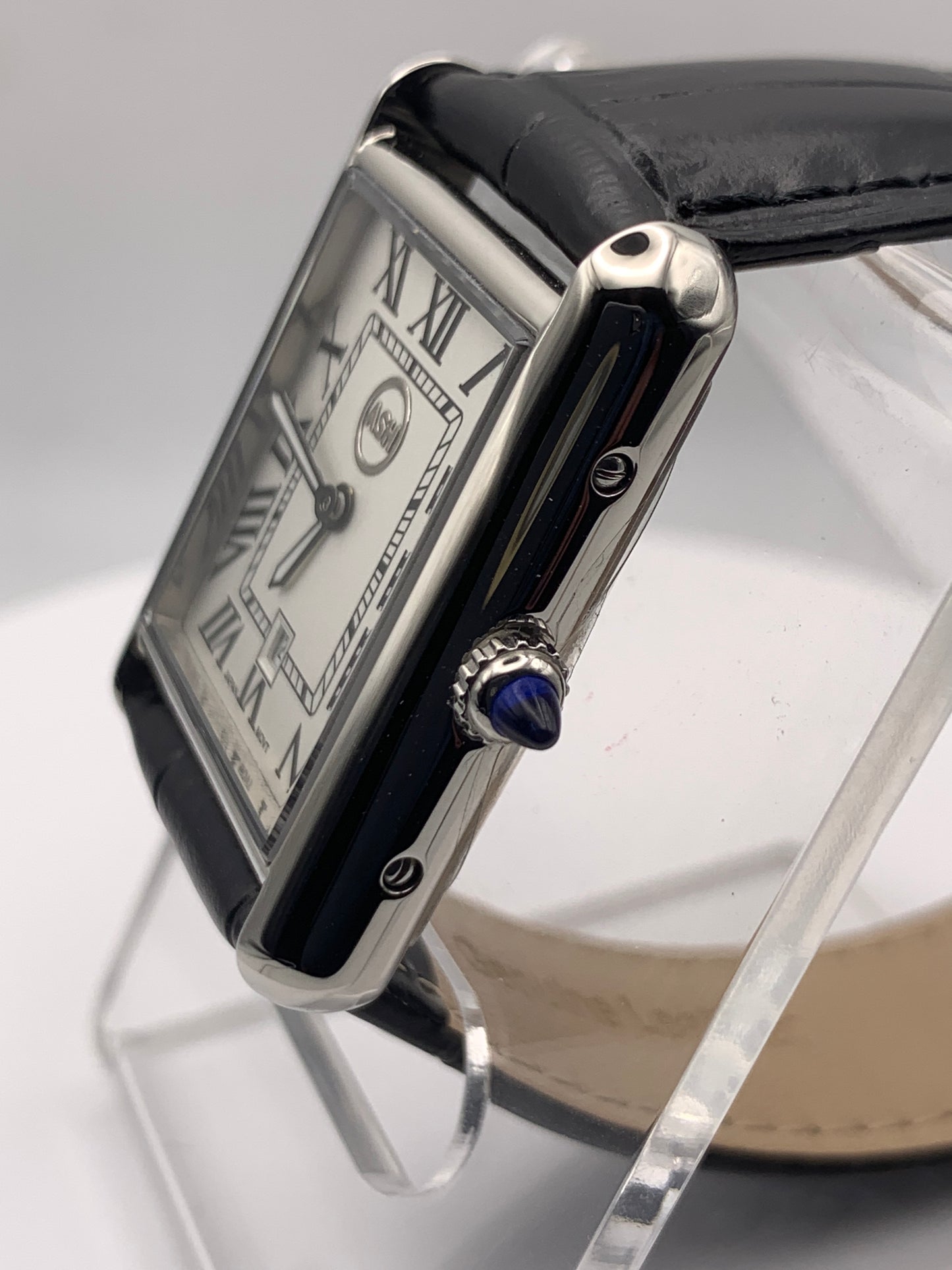 Well Rounded. 8.7mm thick. 26mm stainless steel case. 34mm lug to lug. Seiko VJ24 quartz movement.