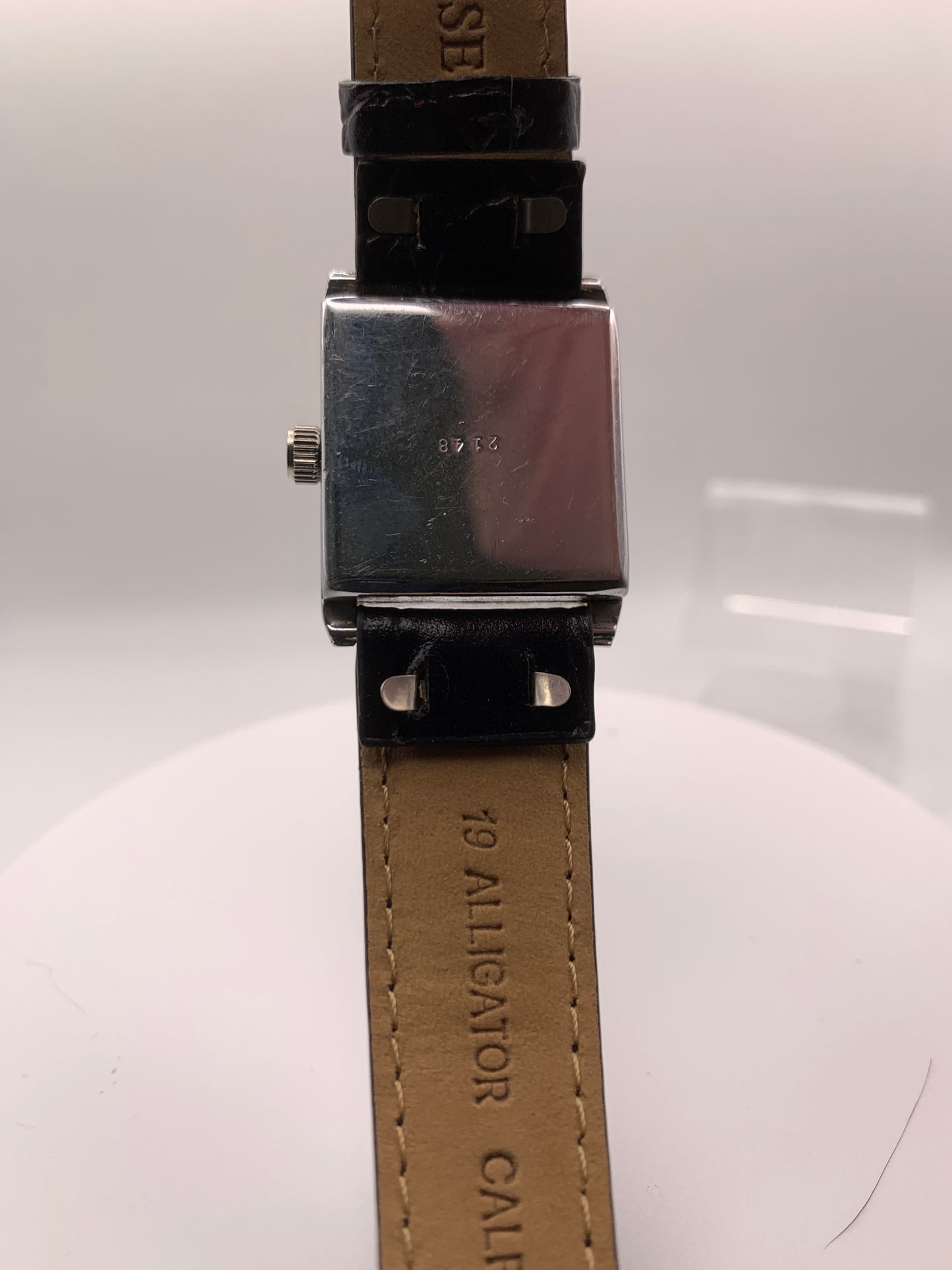 Feather.  Heavy patina vintage hinged brass case. 25 x 33mm. Beautiful figured vintage dial. Acrylic crystal. Miyota 2036 quartz movement.