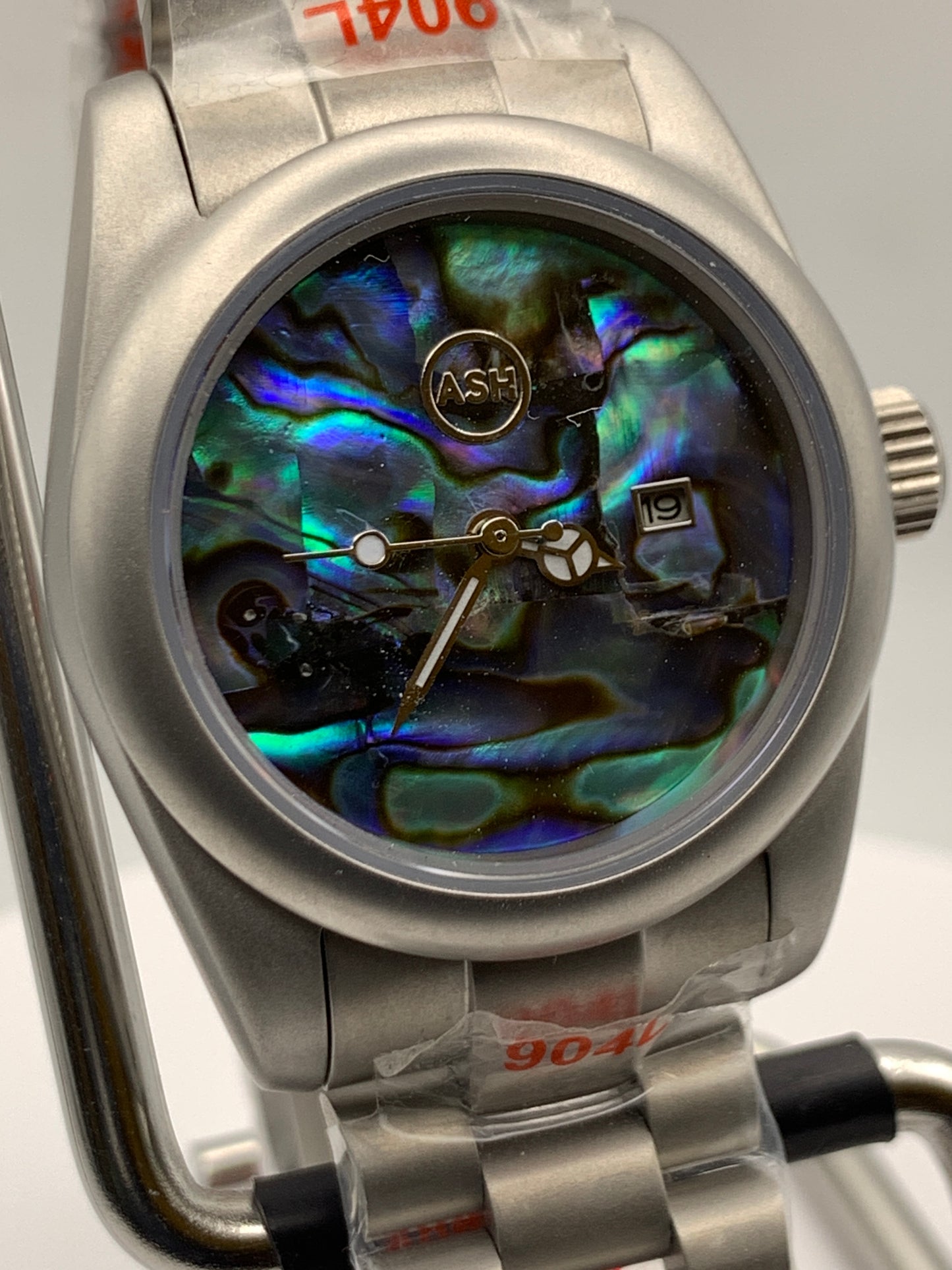 Microcosm. 31mm Brushed stainless steel with matching bracelet. Sapphire crystal. Seiko NH05 automatic.