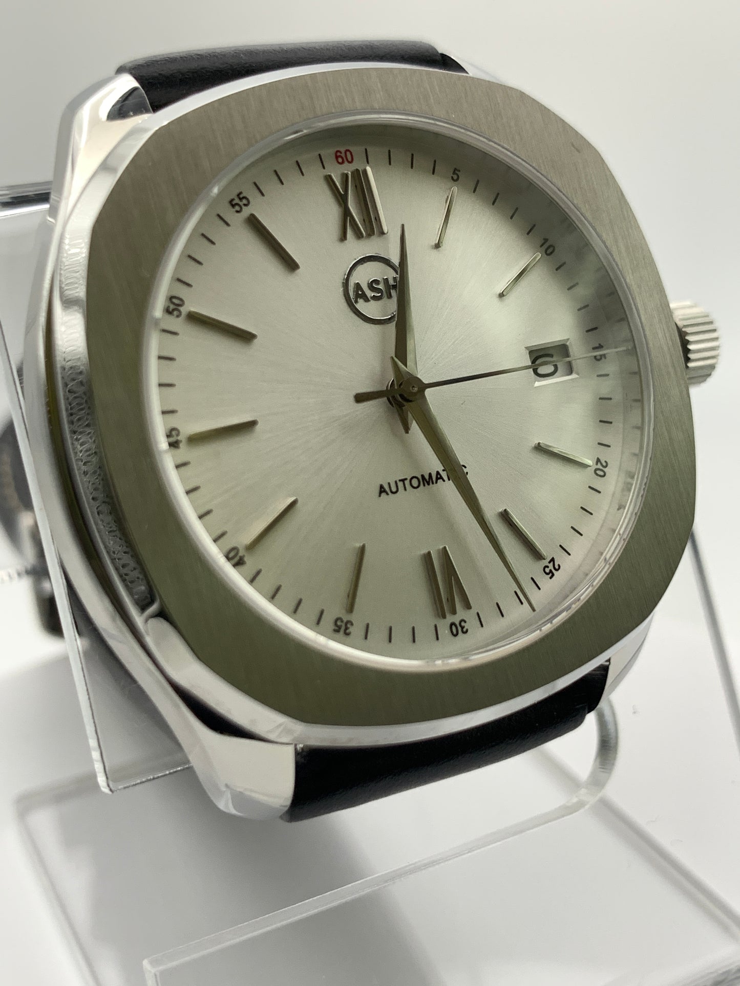 40mm Silver on silver dress watch.