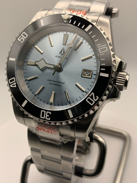 R3CON Collection. Custom light blue dial watch. 40.5mm stainless steel case. Sapphire crystal. Seiko NH35.
