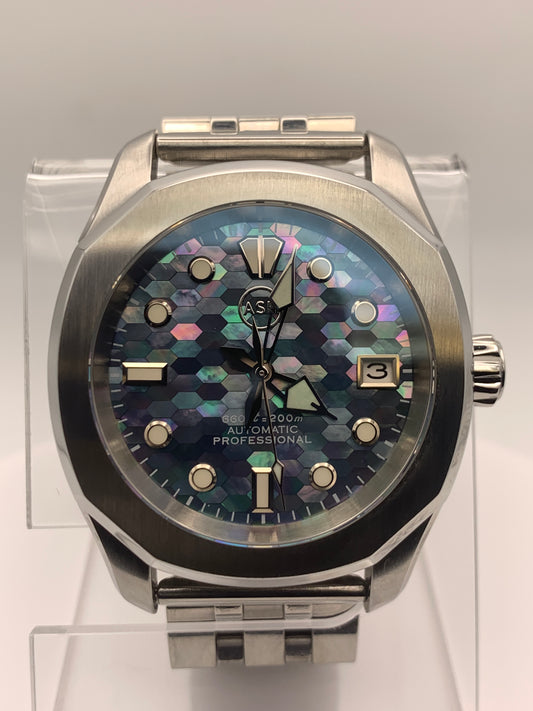 Spectrum. Mosaic mother of pearl dial. 38mm Stainless steel case. Sapphire crystal. NH35 automatic movement.