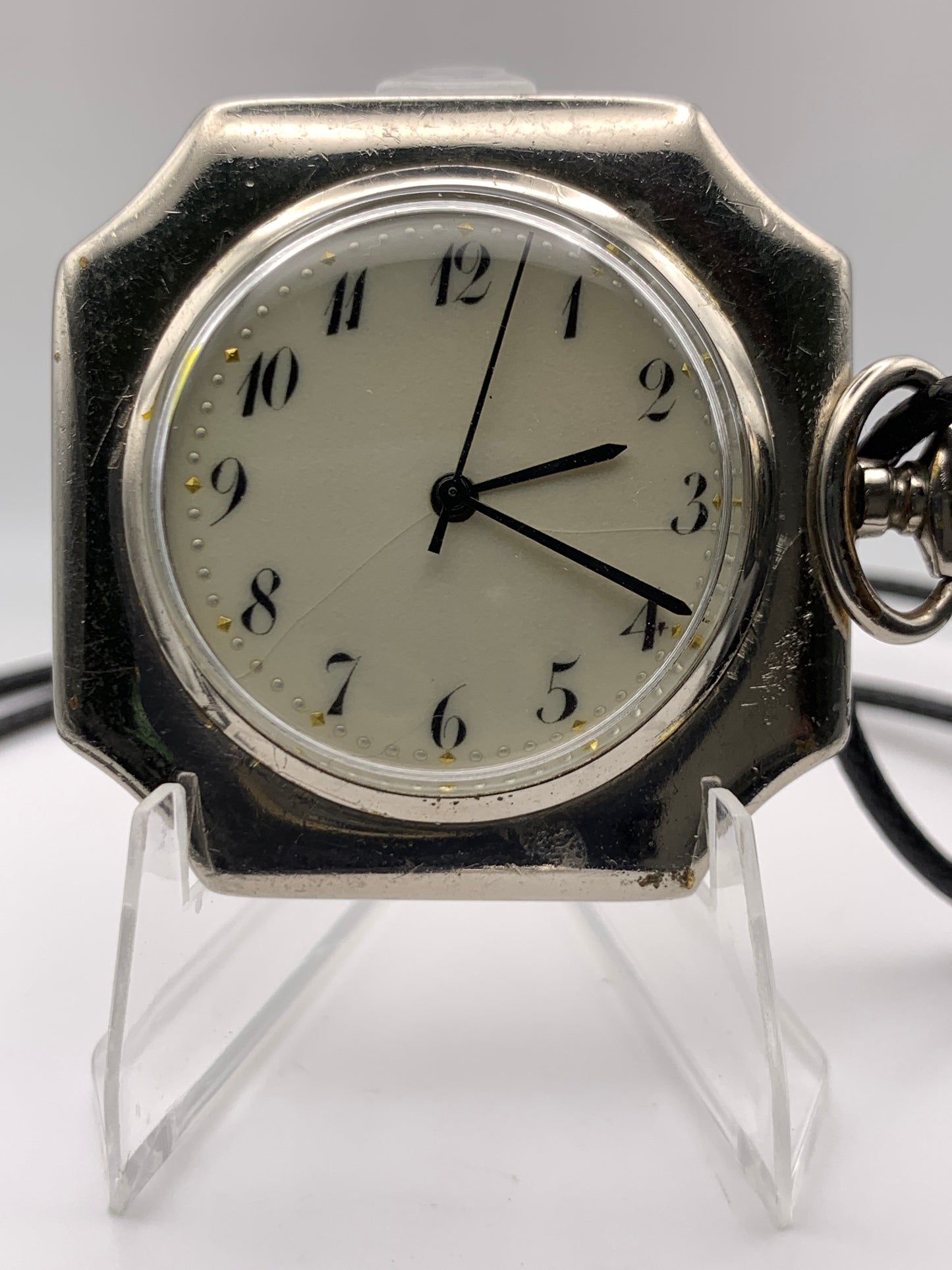 Palimpsest.  40 x 40mm plated brass case. Vintage pendant watch conversion. Domed acrylic crystal. Original enamel dial. Miyota 2036.