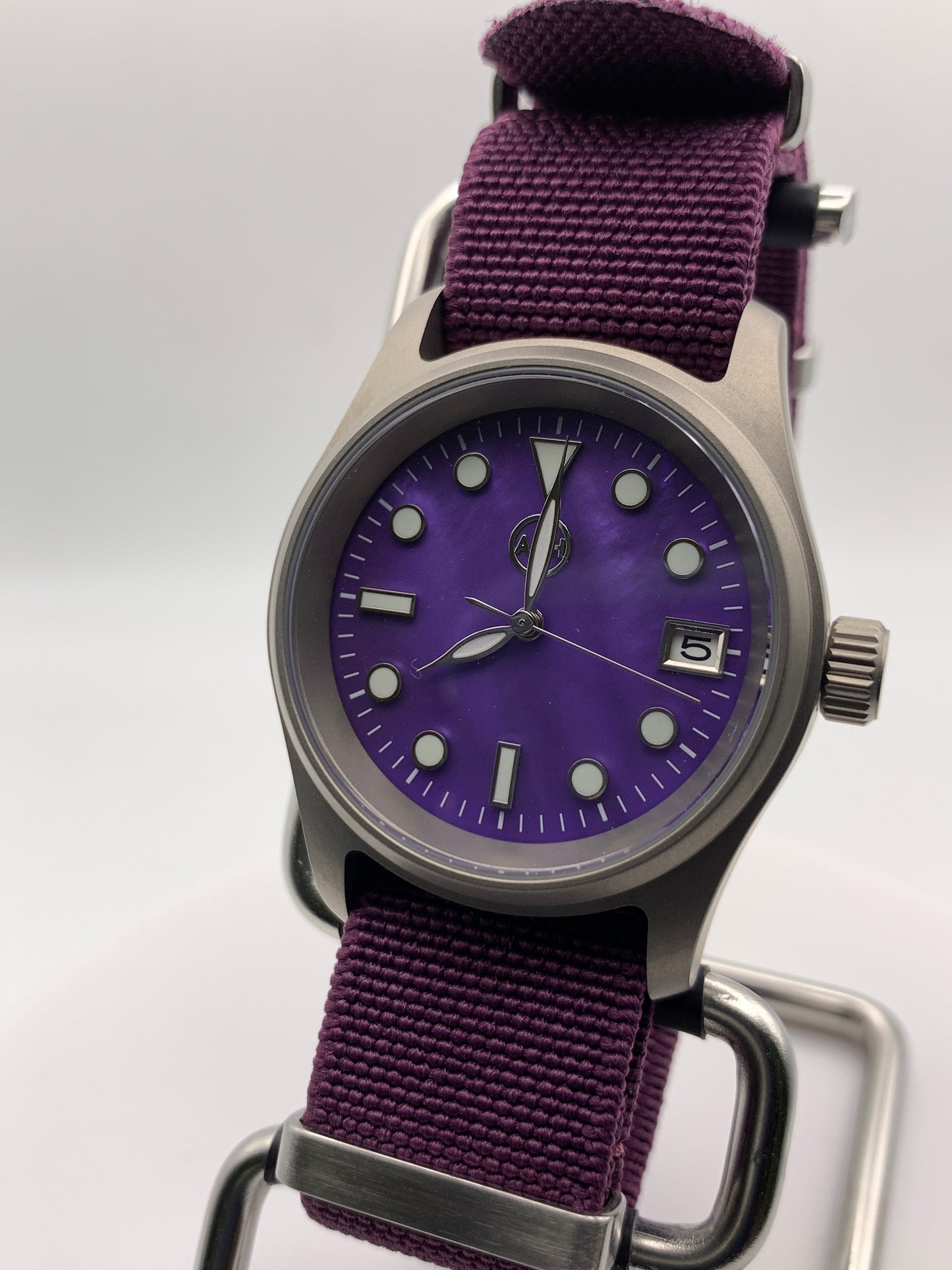Larkspur 1.1 - 36mm Titanium field watch. Purple MOP dial. Seiko NH35.