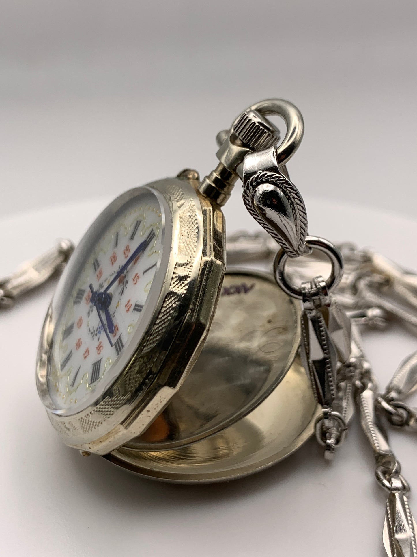 ‘Sold - Amuse-bouche. 30mm pocket / necklace watch. NOS Argentan alloy case and hand painted enamel dial. Sapphire crystal. Miyota 2036. 24” sterling necklace.