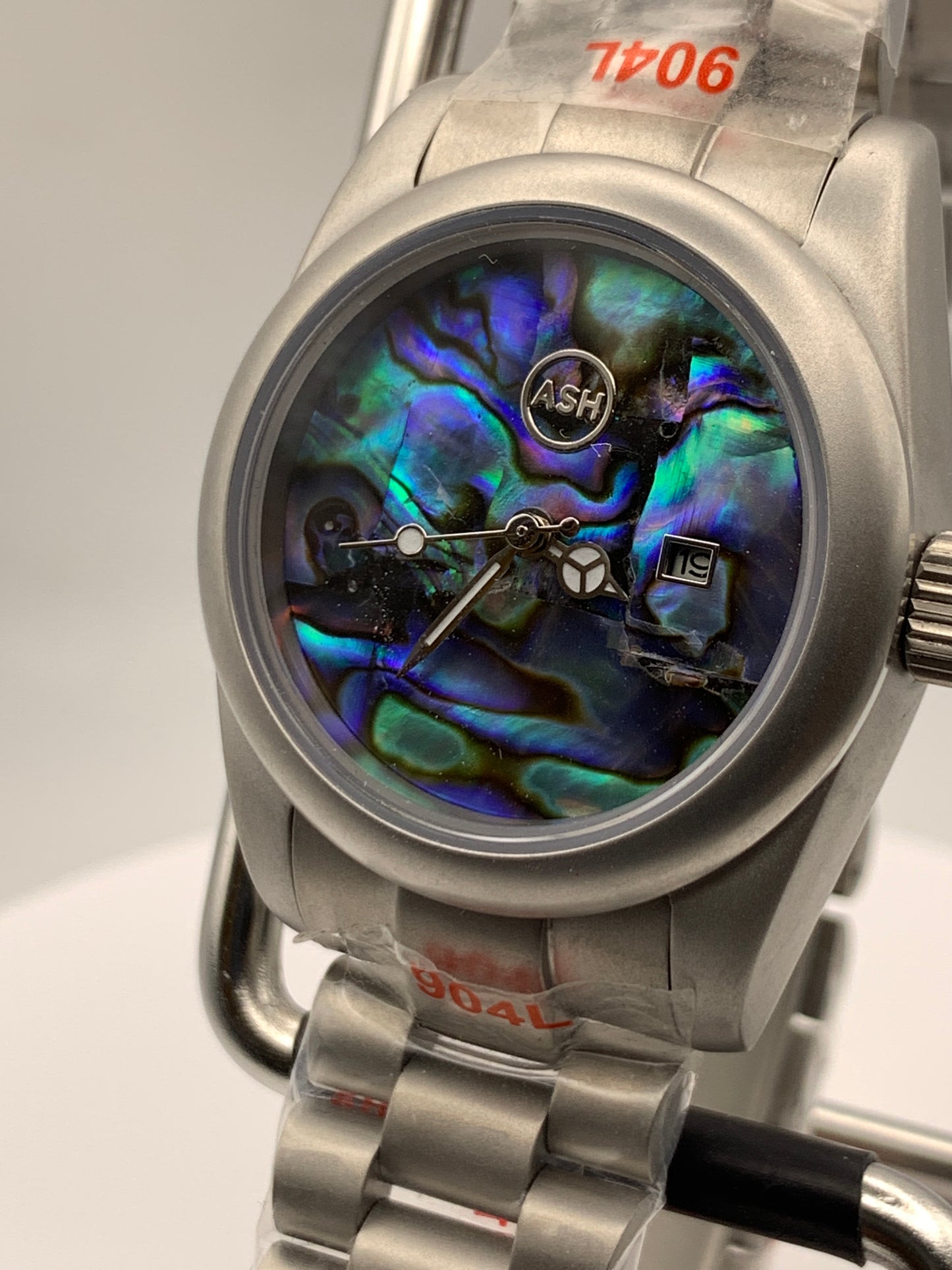 Microcosm. 31mm Brushed stainless steel with matching bracelet. Sapphire crystal. Seiko NH05 automatic.