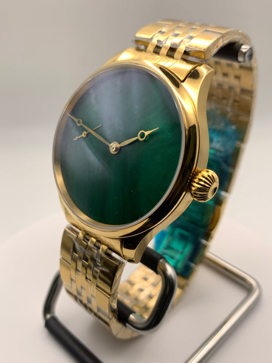 Spring Island. 41mm 18k plated stainless steel case. Sapphire crystal