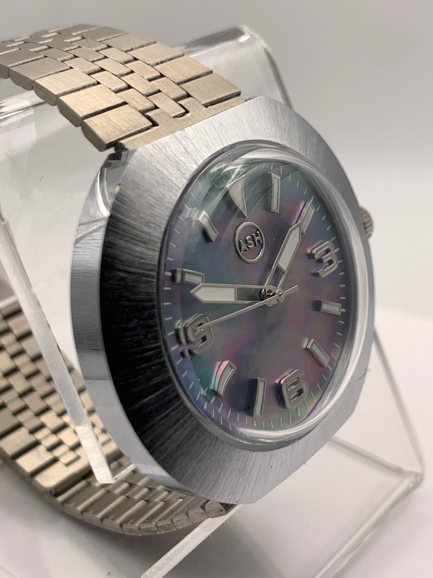 GORT. 41mm Vintage case and NOS vintage bracelet. 37mm lug to lug. MOP dial. Acrylic dome. Seiko VH31 mecha-quartz.