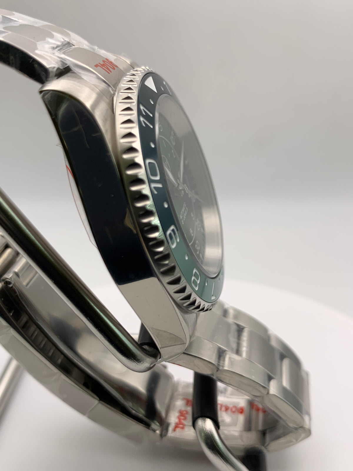 Dead Reckoning - 41mm Stainless Steel case with matching bracelet. Sapphire crystal. Seiko NH36 with green day/date wheels.