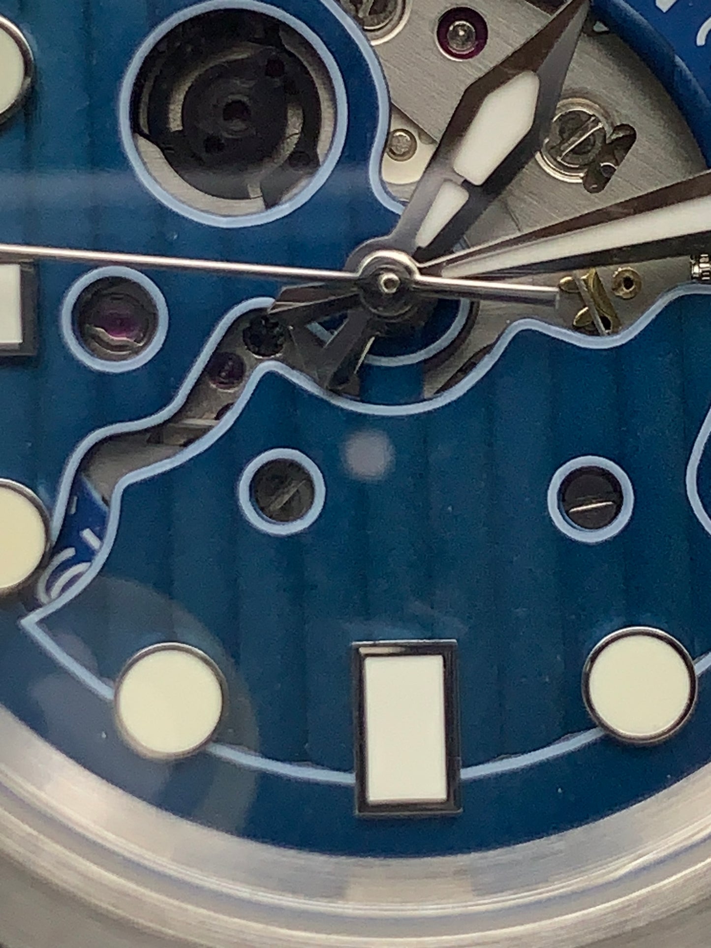 Wintermute. 39mm brushed stainless steel case. Domed sapphire crystal. Seiko NH35 with blue date wheel.