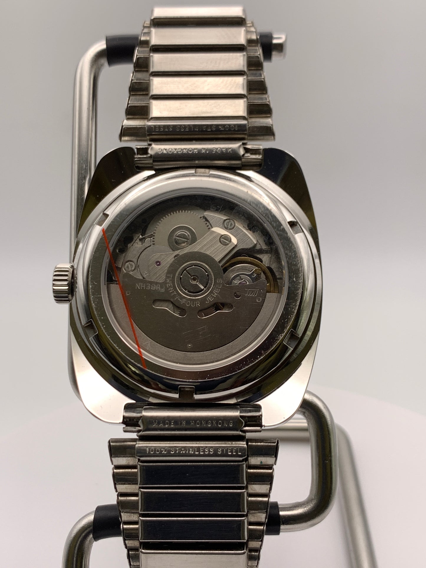 Aspects. 38mm faceted case. Vintage expanding bracelet. Acrylic dome crystal. NH38 automatic movement.