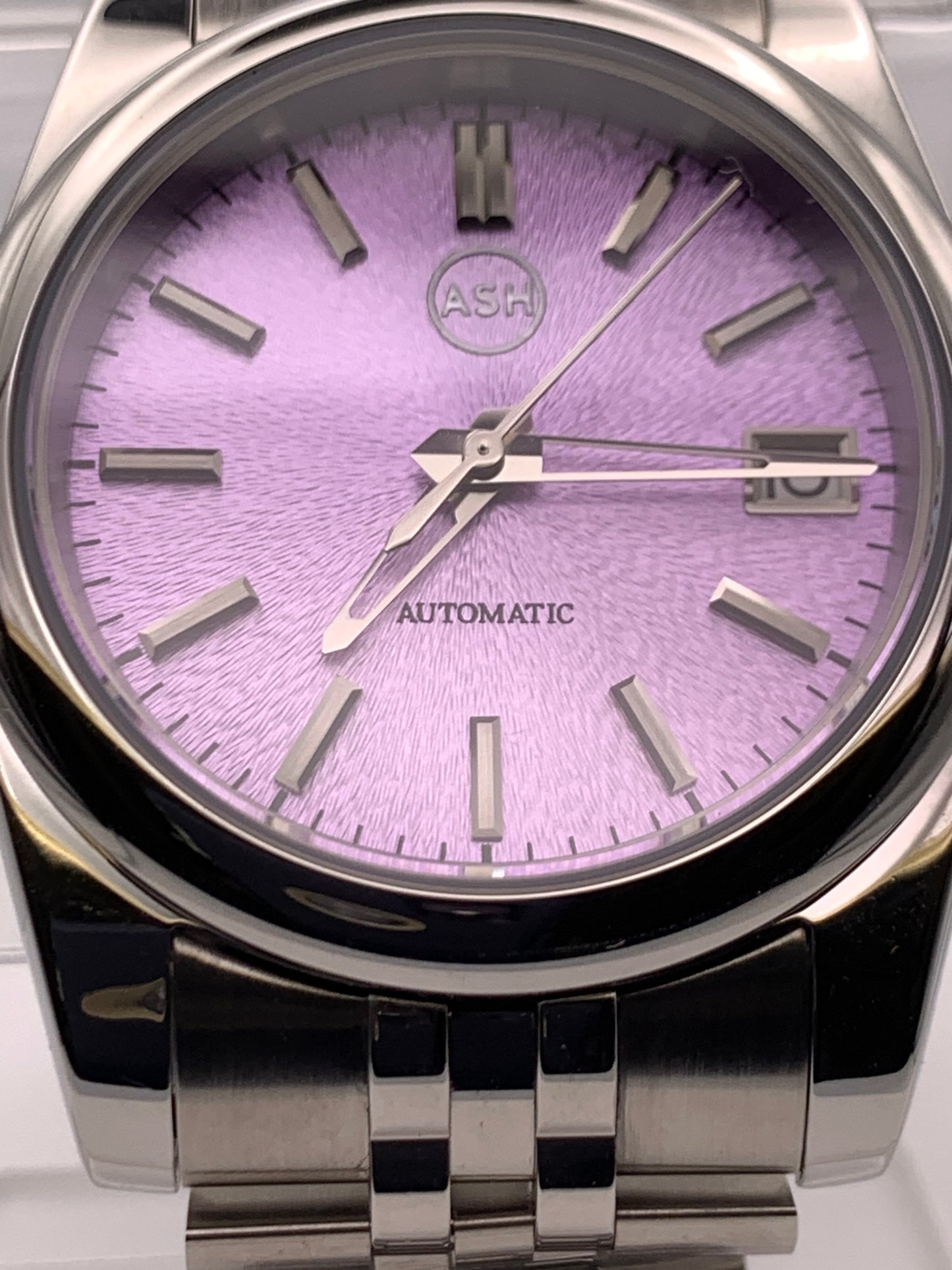 ‘Sold - Highly figured lavender dial. 36mm sport watch on bracelet.