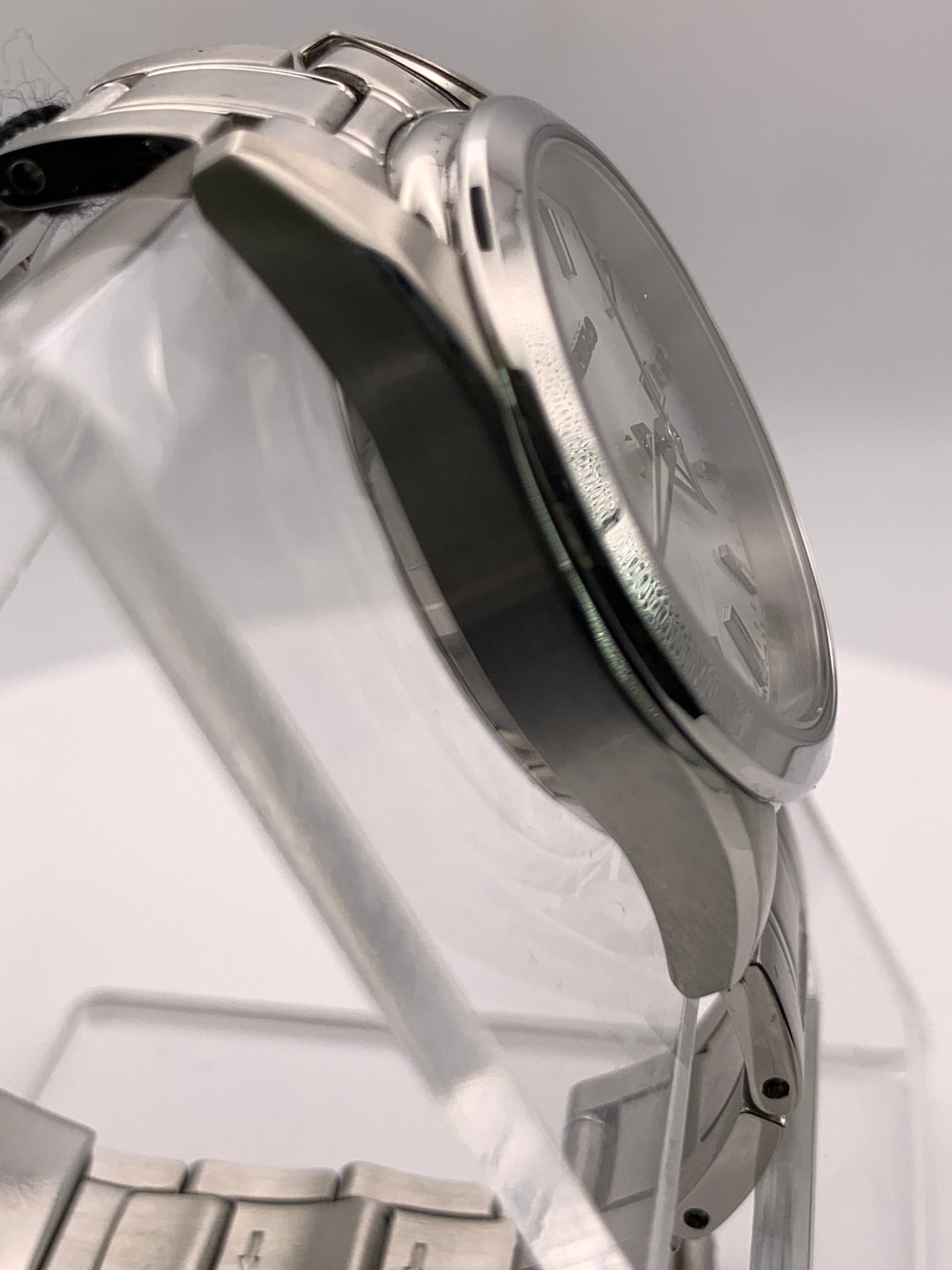 Seiko SUR633- 30mm Stainless steel case. Silver sunray dial. Sapphire crystal. 6n22 quartz movement. 100m water resistance. Box and papers.