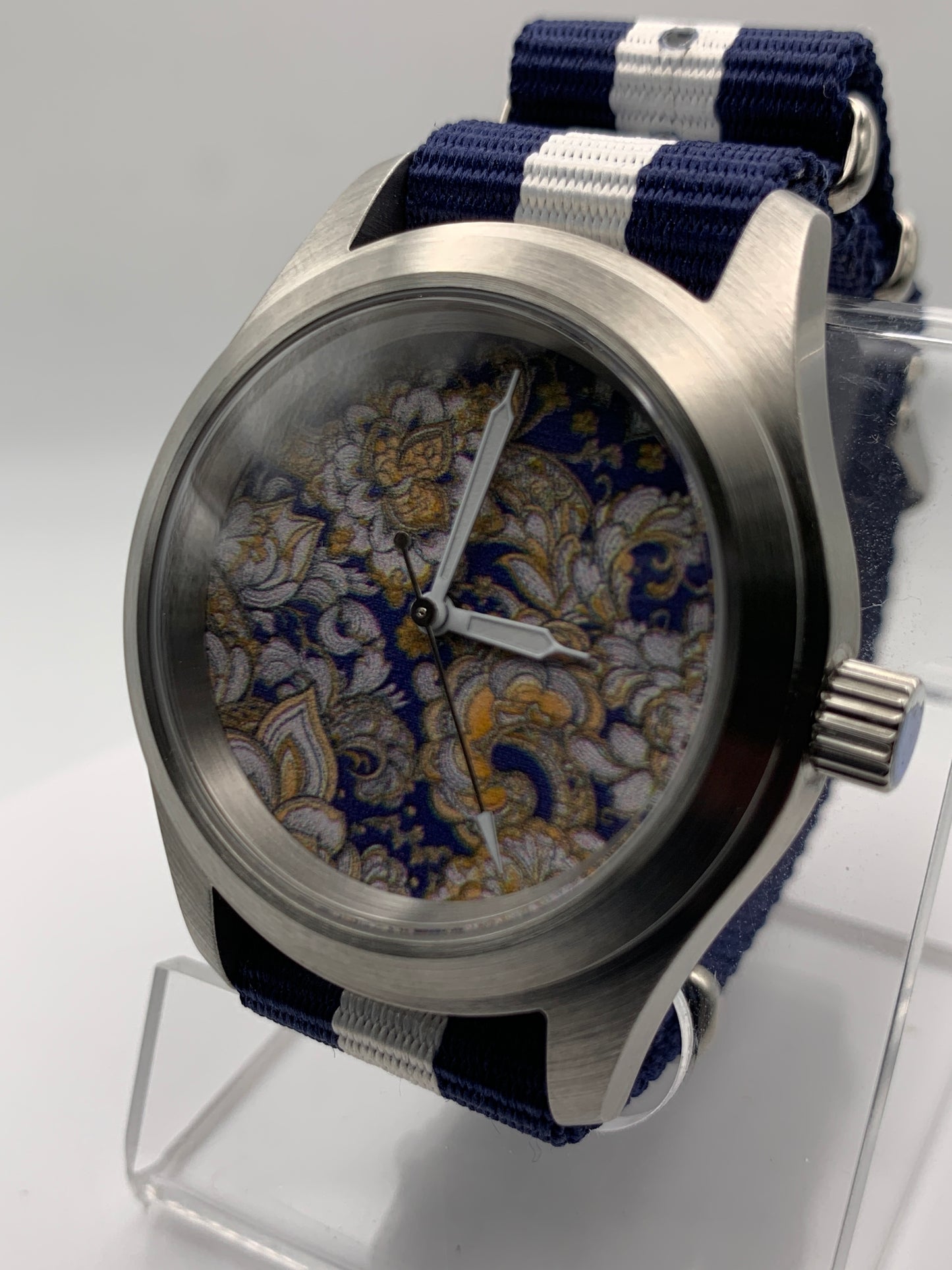 Cloth & Steel. 38mm brushed stainless steel. Ornate dial. Sapphire crystal. Seiko NH38