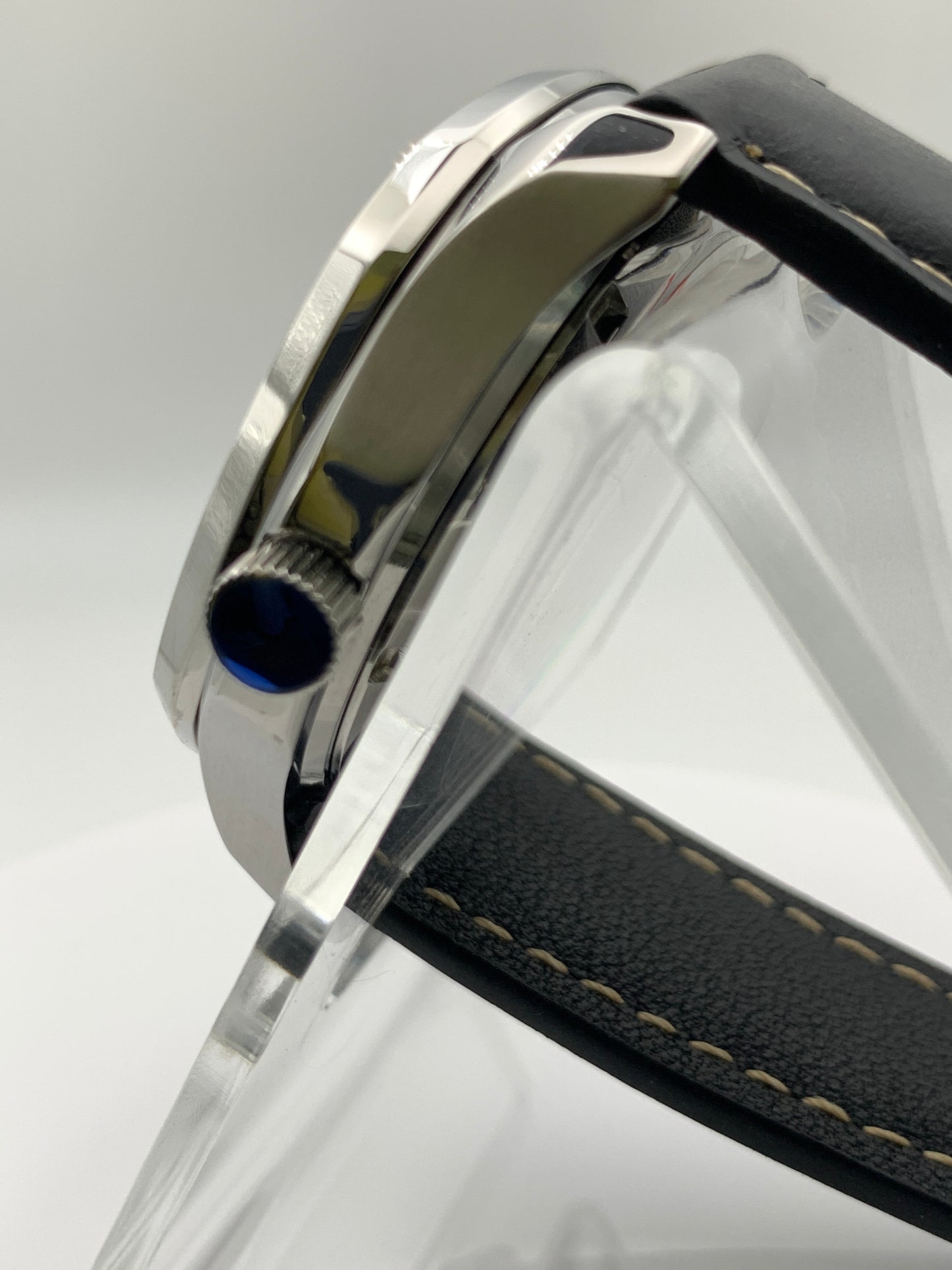 40mm Silver on silver dress watch.