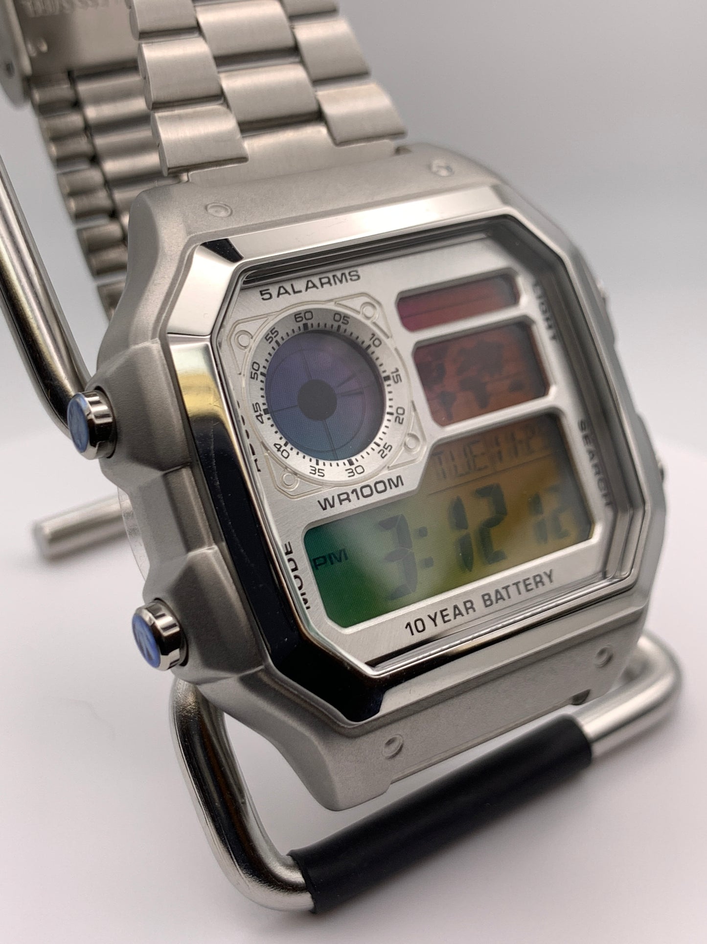 ‘Sold. Royale with Cheese. Casio AE1200. Rainbow filter. Metal case. Silver sunray faceplate. Vintage style bracelet. Flashing alarm upgrade.