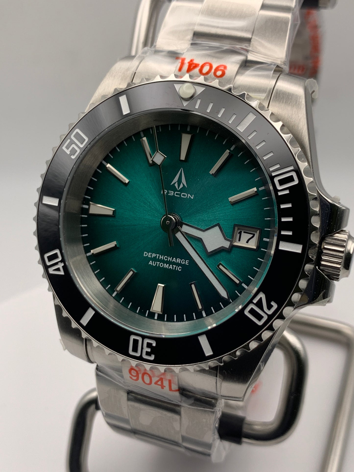 R3CON Collection. Custom teal dial watch. 40.5mm stainless steel case. Sapphire crystal. Seiko NH35.