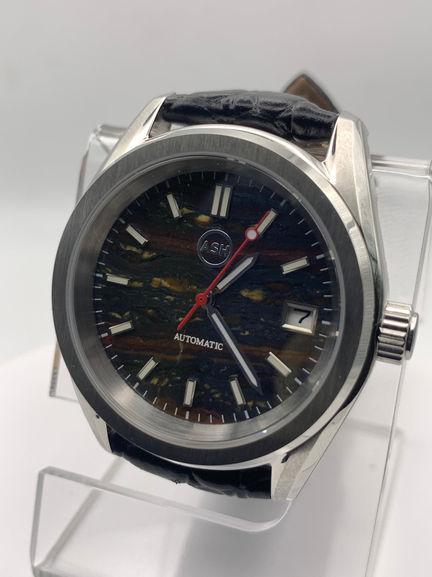 Agharta. 39mm Stainless steel. Iron Tiger Eye dial. Sapphire crystal. Seiko NH35.