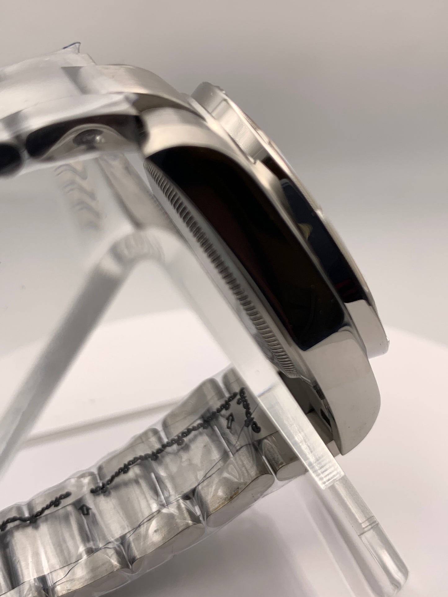 Sunbeam. 39mm stainless steel case and matching bracelet. Textured dial and unique handset. Sapphire crystal. NH38 automatic movement.