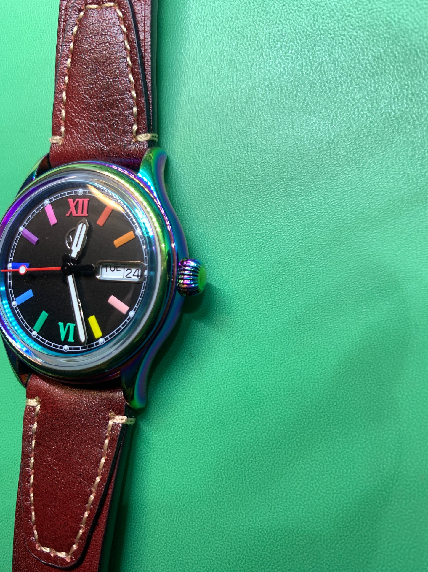 Living Color. 38mm thermally colored stainless steel case and case back. Double dome K-1 mineral crystal. Seiko NH36