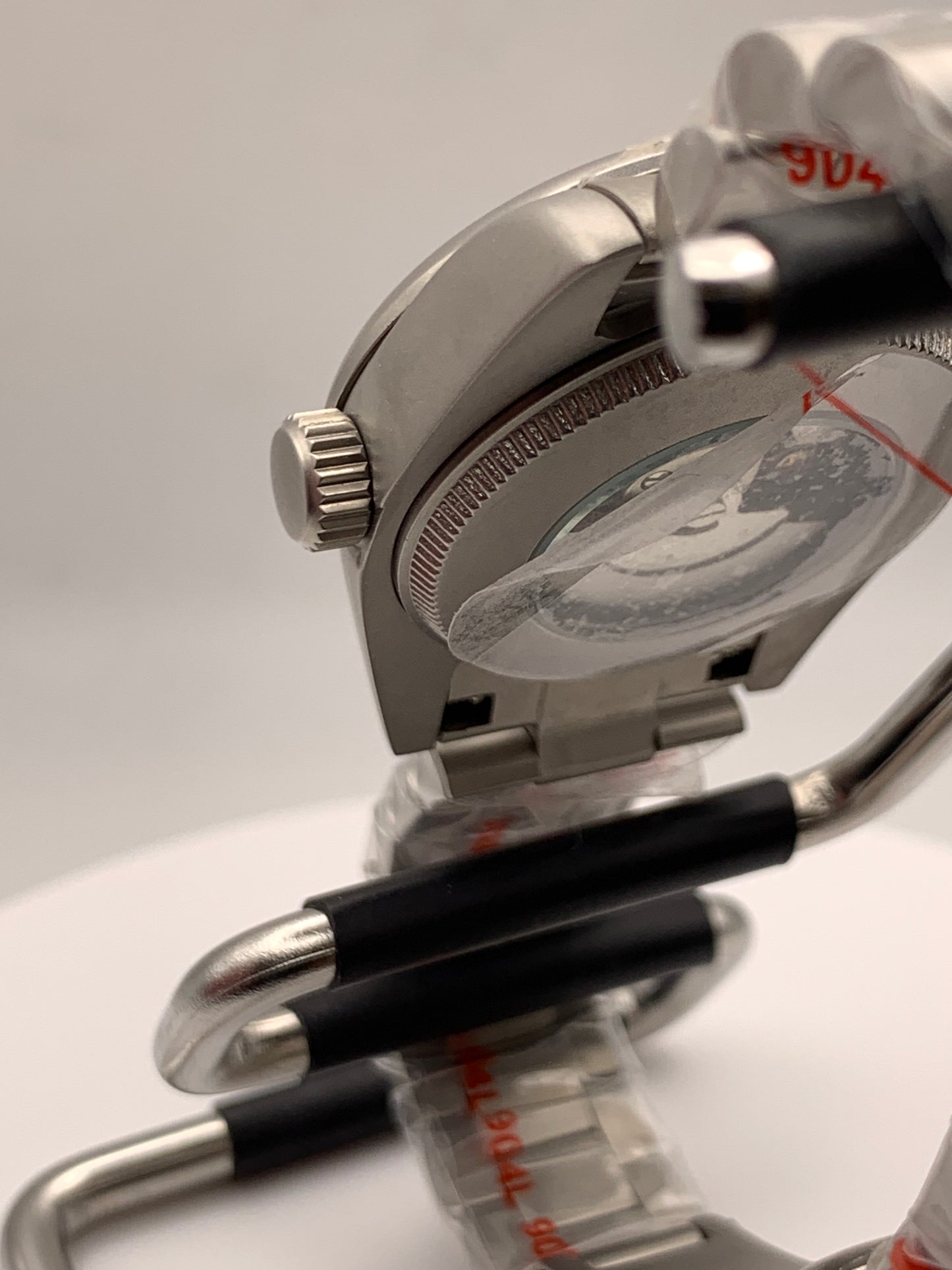 Microcosm. 31mm Brushed stainless steel with matching bracelet. Sapphire crystal. Seiko NH05 automatic.