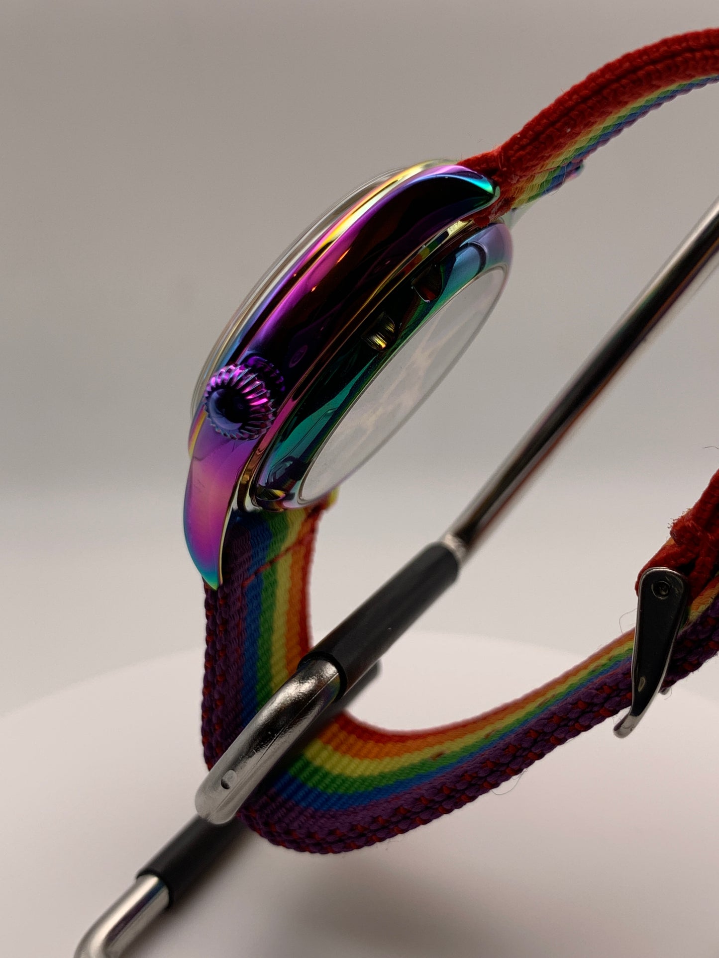 Portable rainbow. 38mm thermally colored stainless steel case and case back. Double dome K-1 mineral crystal. Seiko NH35.