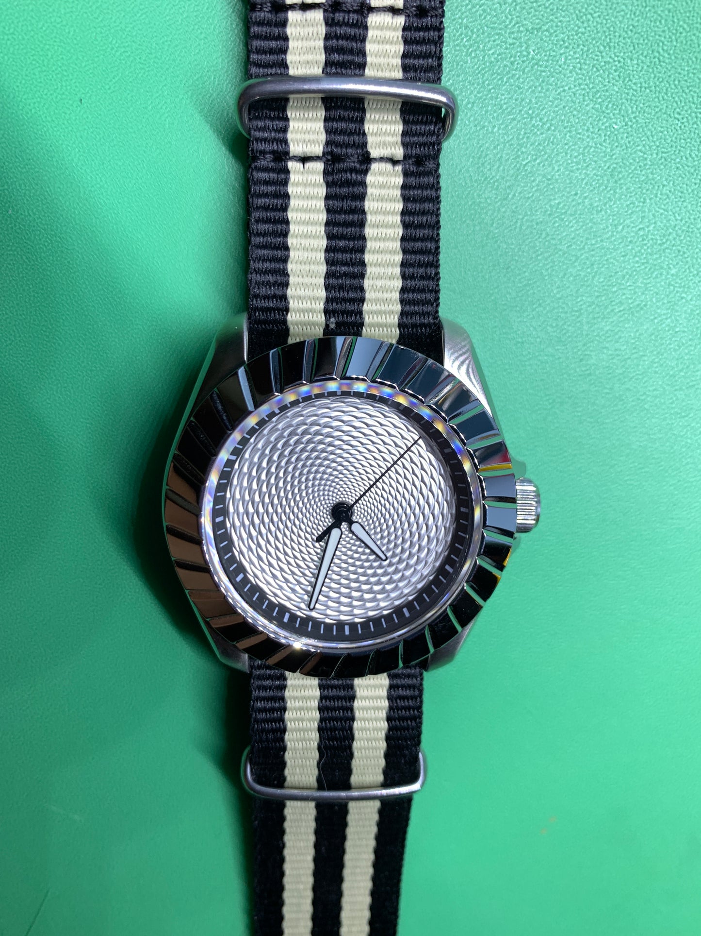 Indra’s Net. 41mm Stainless steel case.  Sapphire crystal. Seiko NH38.