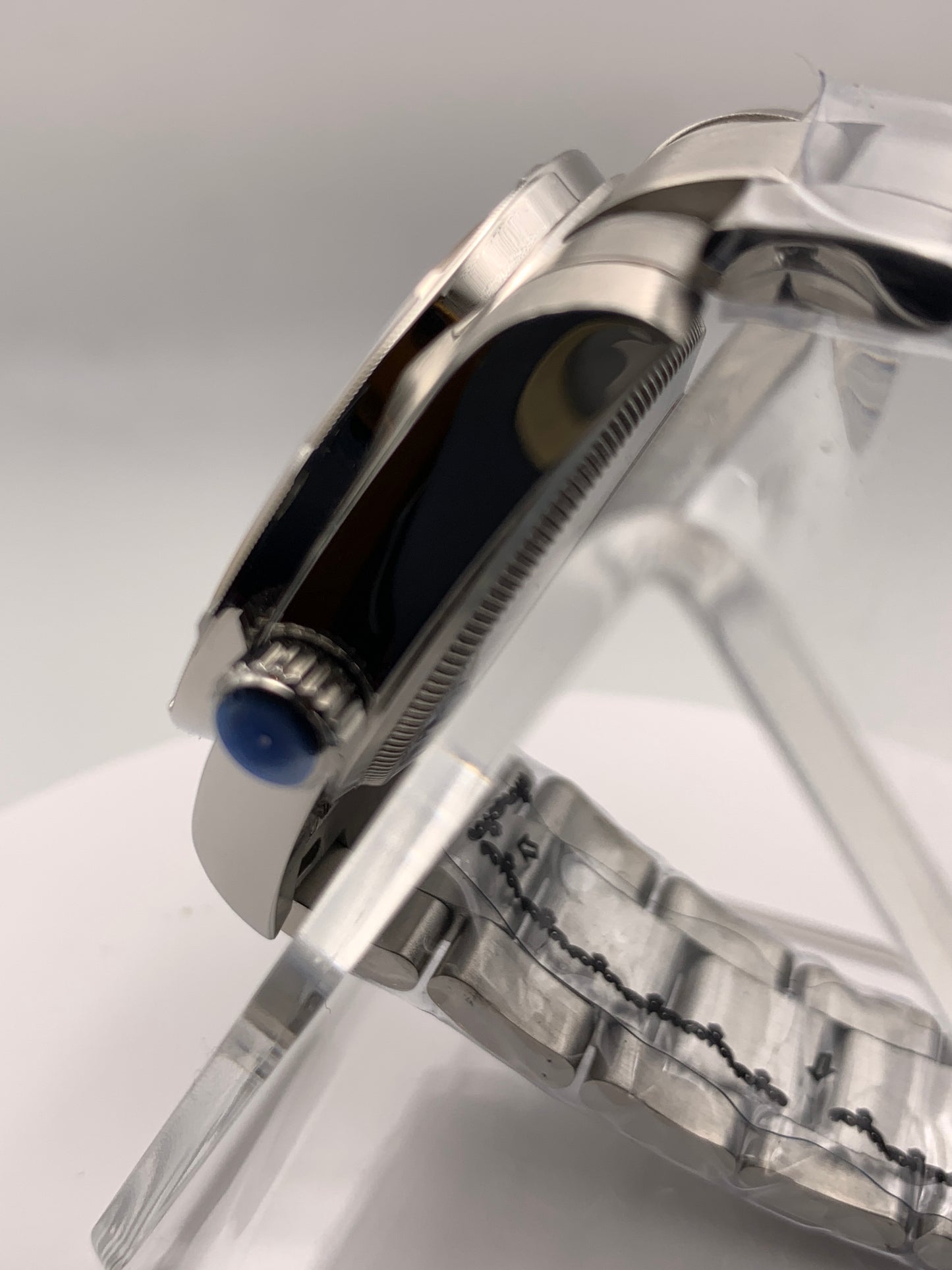 Sunbeam. 39mm stainless steel case and matching bracelet. Textured dial and unique handset. Sapphire crystal. NH38 automatic movement.