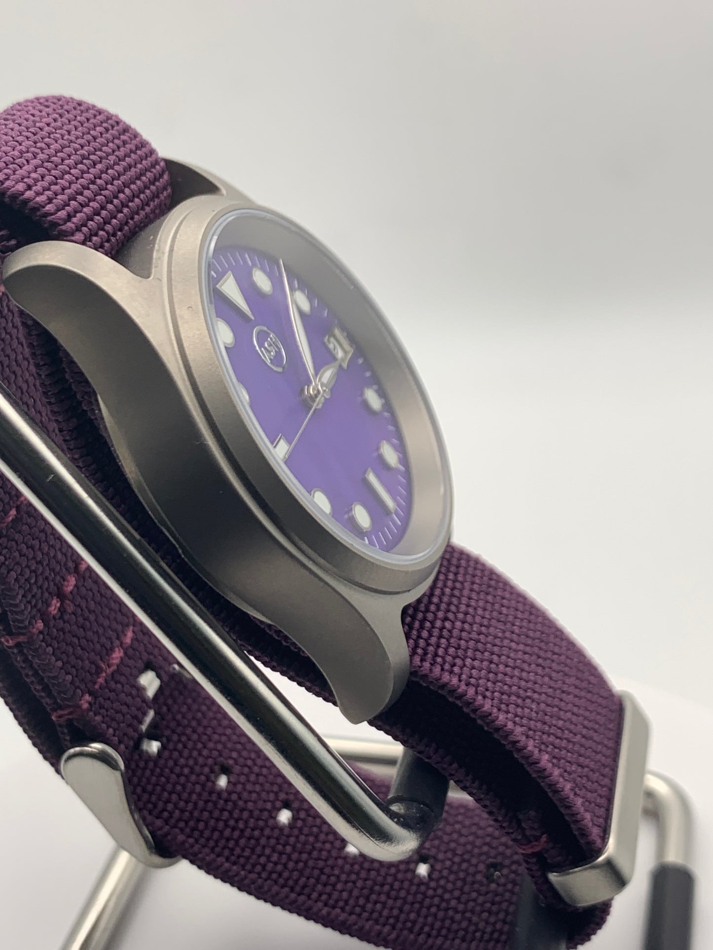 Larkspur. 36mm Titanium field watch. Purple MOP dial. Seiko NH35.