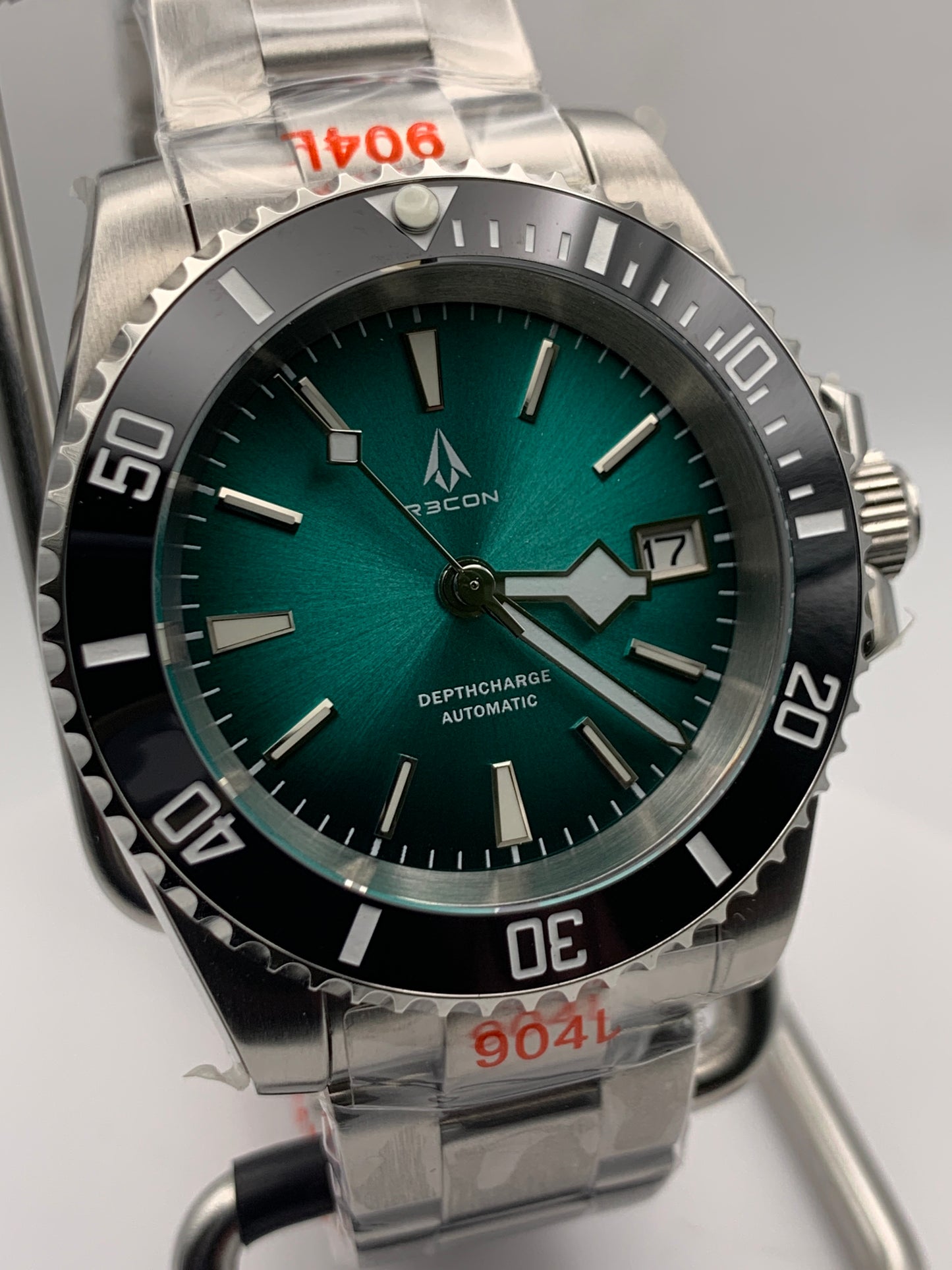R3CON Collection. Custom teal dial watch. 40.5mm stainless steel case. Sapphire crystal. Seiko NH35.
