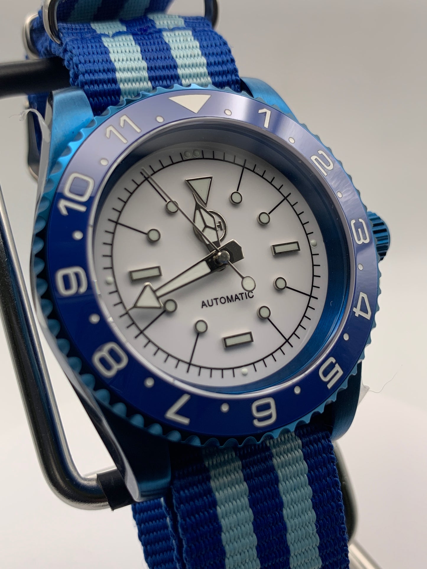 Europa - 41mm Blue anodized stainless steel case. Sapphire crystal. Seiko NH38.