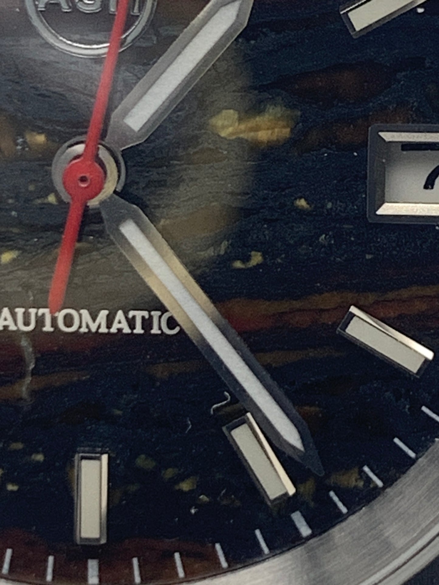 Agharta. 39mm Stainless steel. Iron Tiger Eye dial. Sapphire crystal. Seiko NH35.