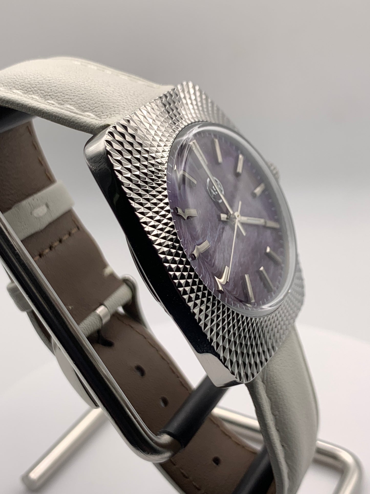 Lily. Faceted 37mm stainless steel case. Acrylic domed crystal. Charlotte stone dial.  Seiko VH31 mecha-quartz.