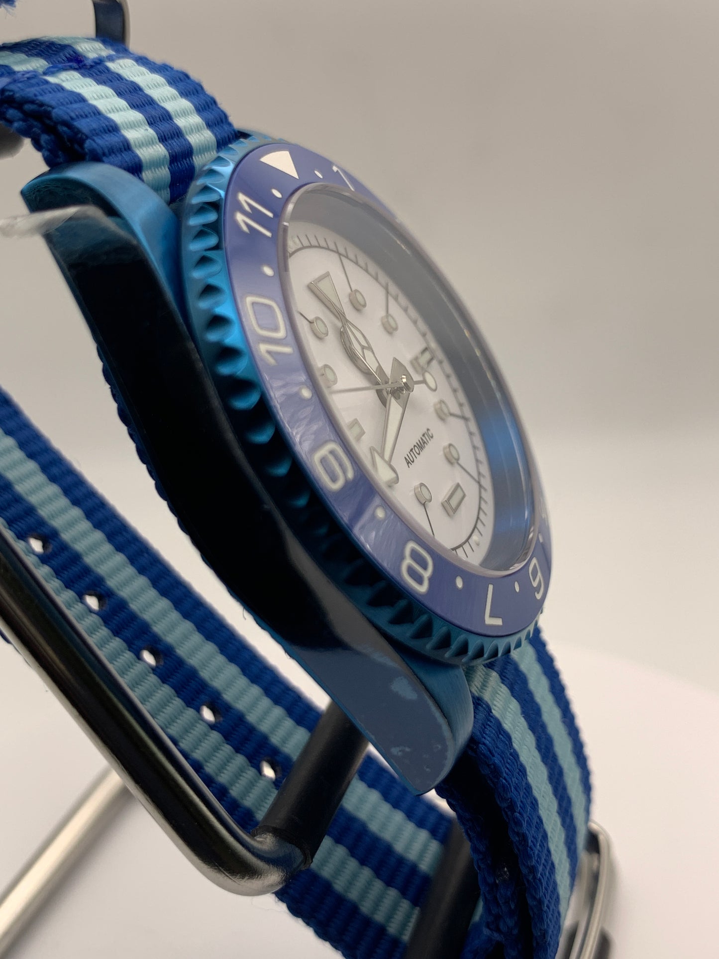 Europa - 41mm Blue anodized stainless steel case. Sapphire crystal. Seiko NH38.