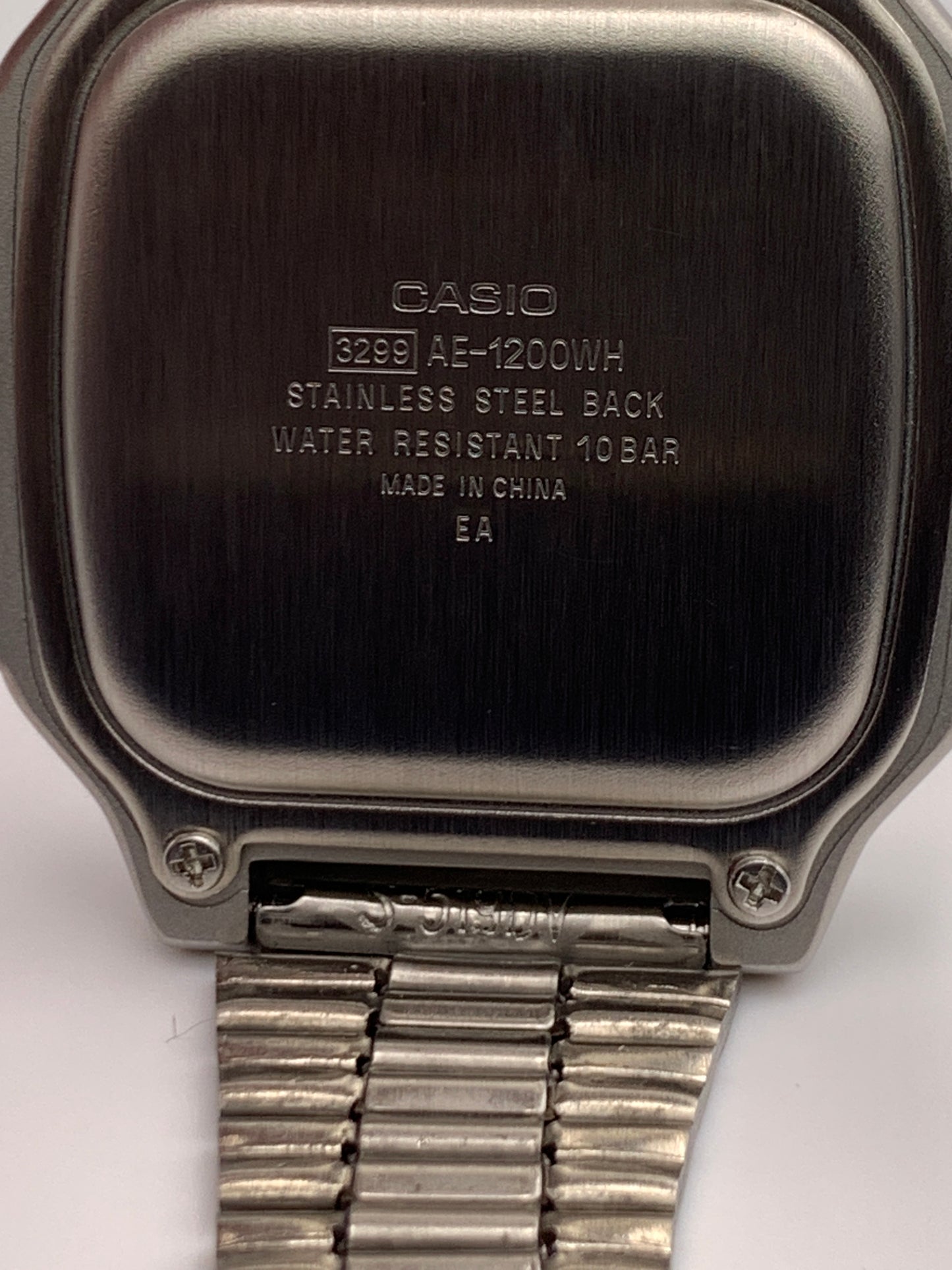 ‘Sold. Royale with Cheese. Casio AE1200. Rainbow filter. Metal case. Silver sunray faceplate. Vintage style bracelet. Flashing alarm upgrade.
